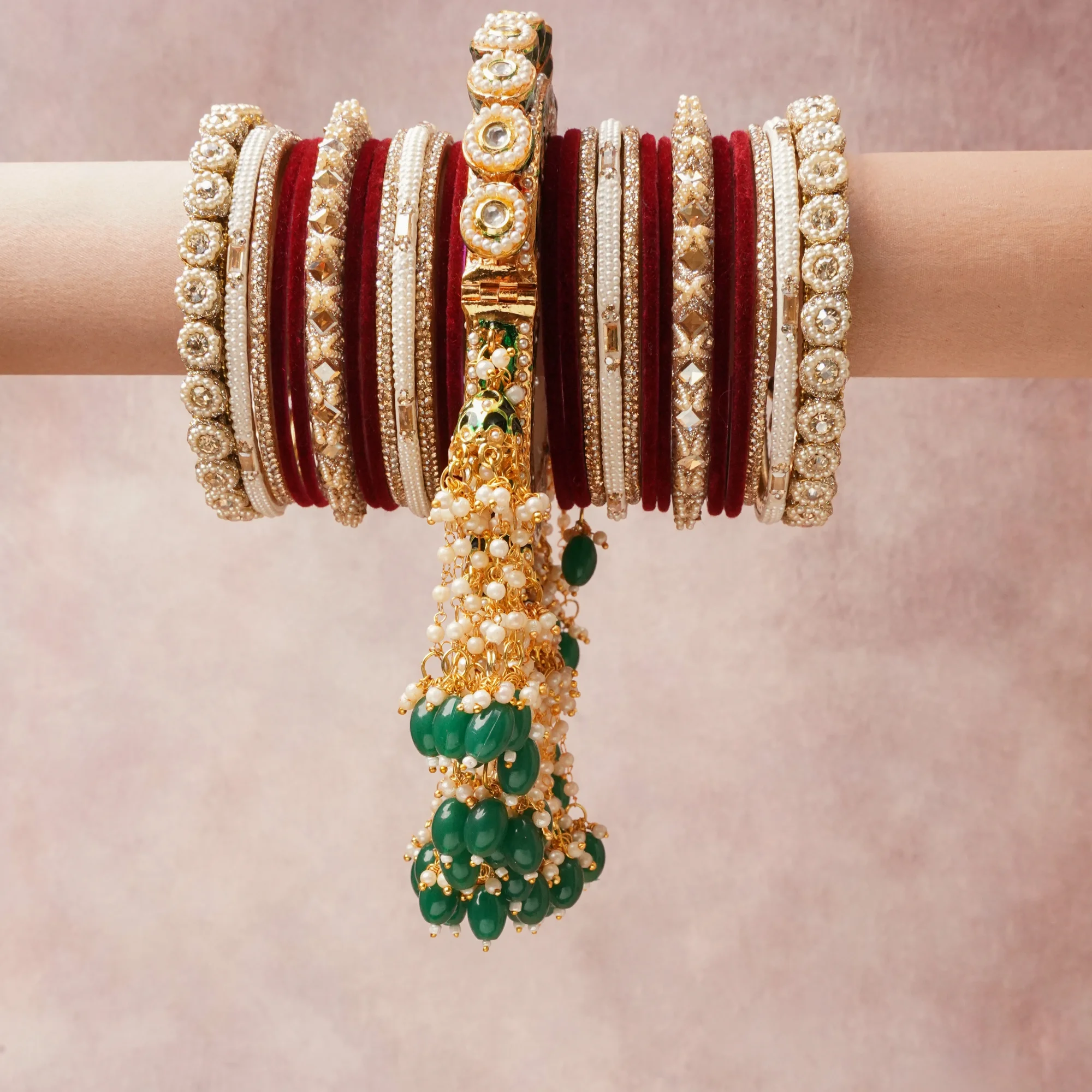 The Femminari Crown- Jewellery beyond luxury. A crown colour Deep Maroon set, complemented by Emerald Green, Clear Crystal, featuring Gold-plated Metal Alloy, Velvet, Faux Pearls, Kundan Glass, Rhinestone Crystals, Enamel, Green Agate, Lac/Resin. A treat for the eyes, hands and heart- absolutely unforgettable.