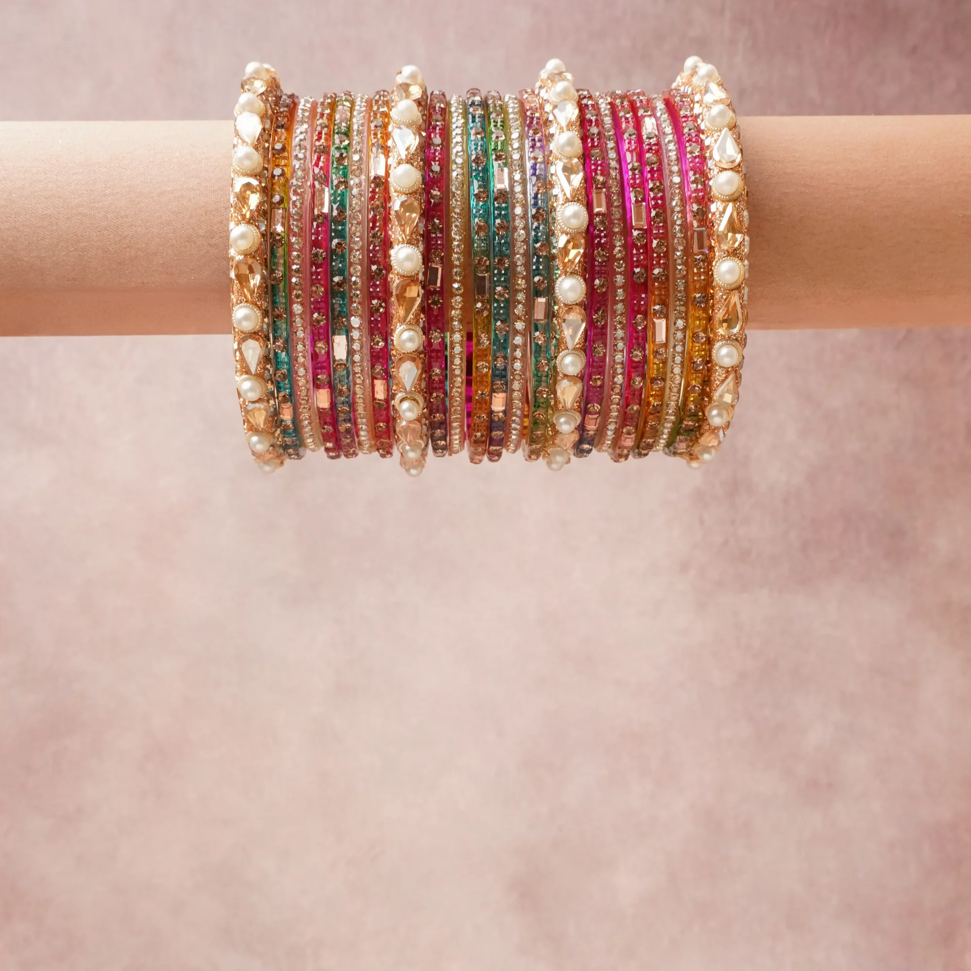 A grounding Multi colour forms the heart of the set, while touches of Clear Crystal, Cream Pearl, Bright Gold, Golden Topaz add charm.

A thoughtful composition of Glass, Gold-Toned Metal Alloy, Rhinestones, Simulated Pearls, Faceted Glass Stones, designed to feel complete without being heavy.
Each element layers seamlessly, creating a look that is refined, wearable and quietly striking.