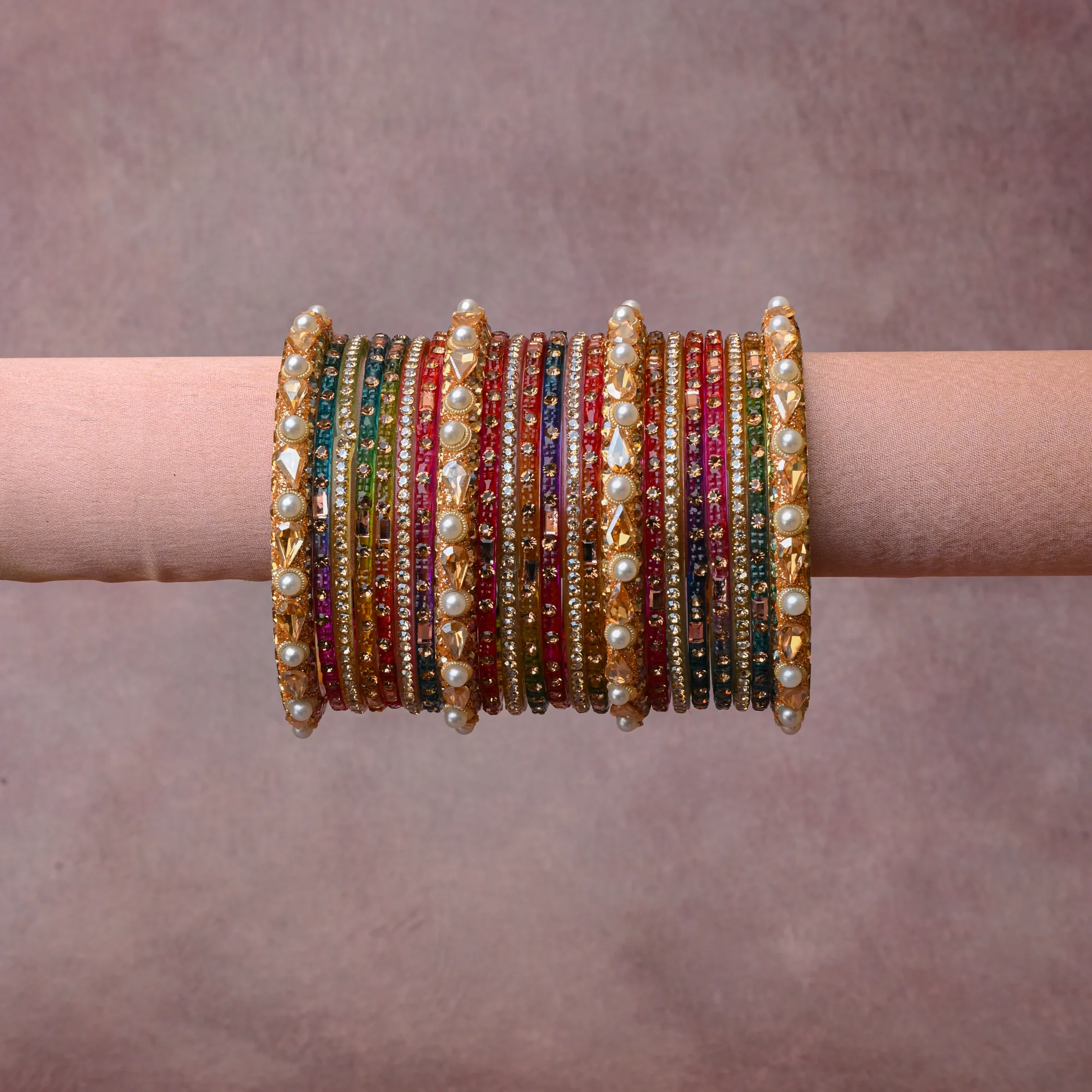 A grounding Multi colour forms the heart of the set, while touches of Clear Crystal, Cream Pearl, Bright Gold, Golden Topaz add charm.

A thoughtful composition of Glass, Gold-Toned Metal Alloy, Rhinestones, Simulated Pearls, Faceted Glass Stones, designed to feel complete without being heavy.
Each element layers seamlessly, creating a look that is refined, wearable and quietly striking.