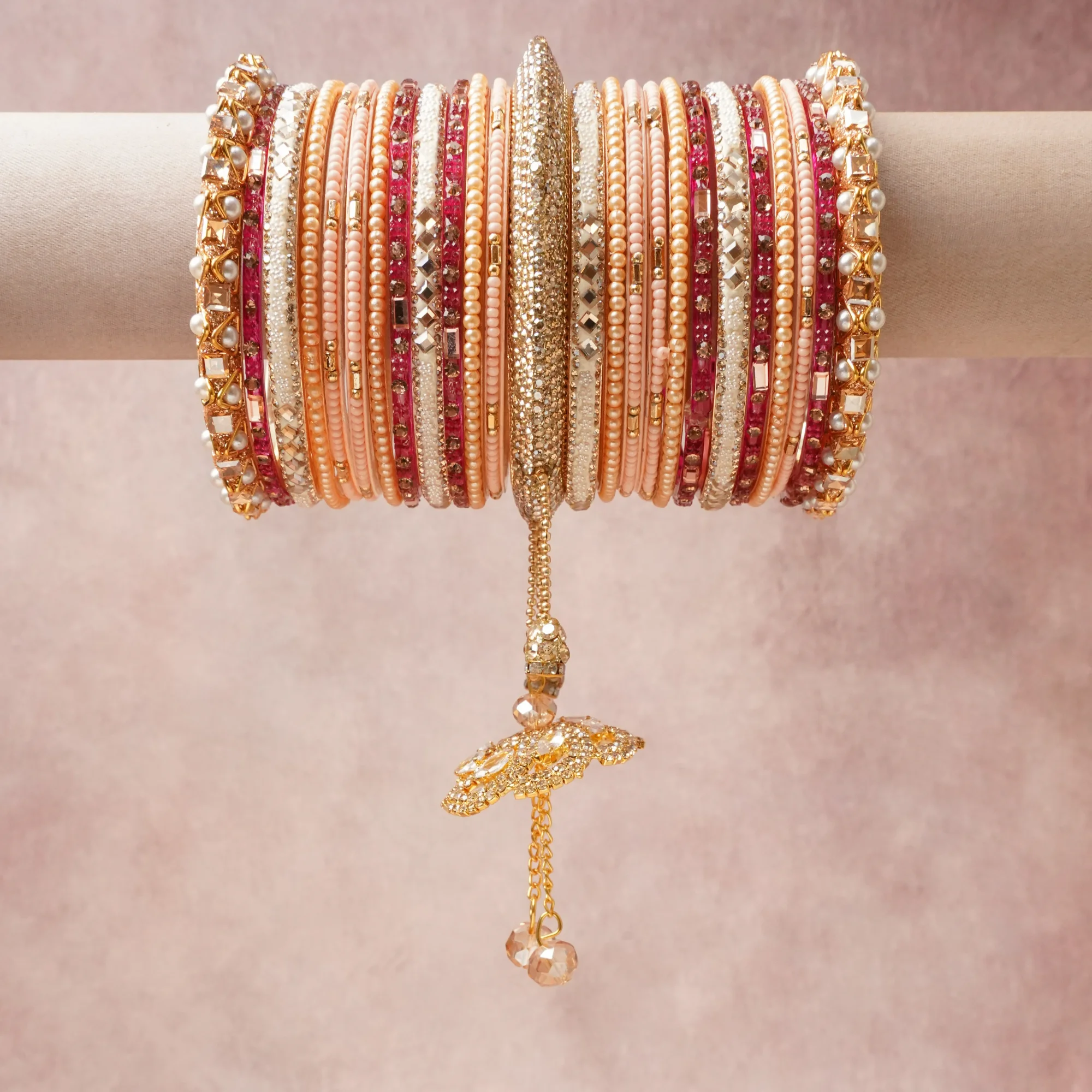 A grounding Gold forms the heart of the set, while touches of Clear Crystal, Cream Pearl add charm.

A thoughtful composition of Gold-toned Metal, Glass Beads, Crystal Rhinestones, Faux Pearls, Fabric, designed to feel complete without being heavy.
Each element layers seamlessly, creating a look that is refined, wearable and quietly striking.