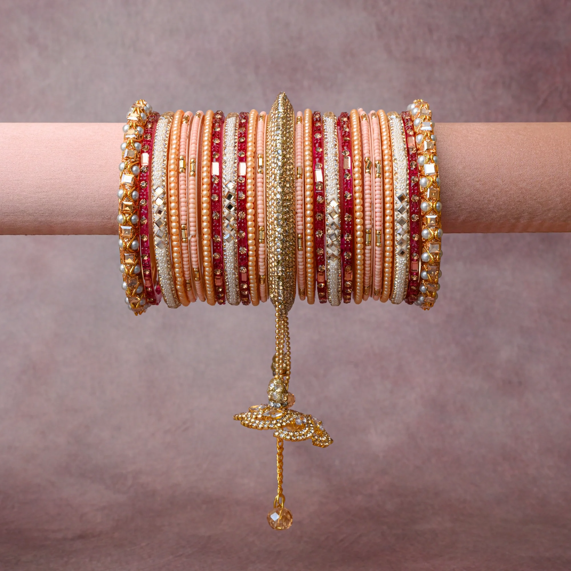 A grounding Gold forms the heart of the set, while touches of Clear Crystal, Cream Pearl add charm.

A thoughtful composition of Gold-toned Metal, Glass Beads, Crystal Rhinestones, Faux Pearls, Fabric, designed to feel complete without being heavy.
Each element layers seamlessly, creating a look that is refined, wearable and quietly striking.