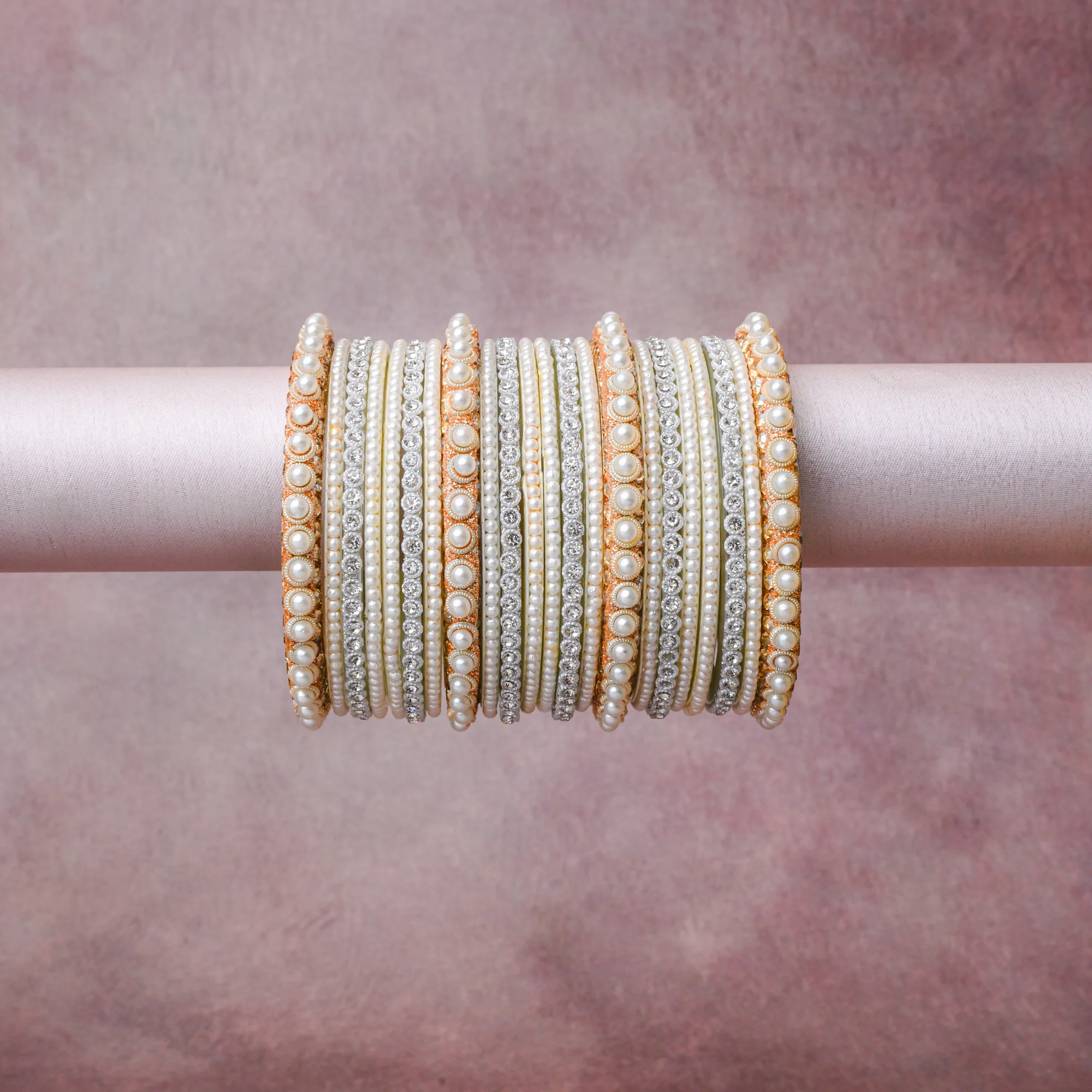 A grounding Cream White forms the heart of the set, while touches of Rose Gold, Silver, Iridescent Pearl add charm.

A thoughtful composition of Simulated Pearls, Rhinestones, Gold-toned Metal, Silver-toned Metal, designed to feel complete without being heavy.
Each element layers seamlessly, creating a look that is refined, wearable and quietly striking.