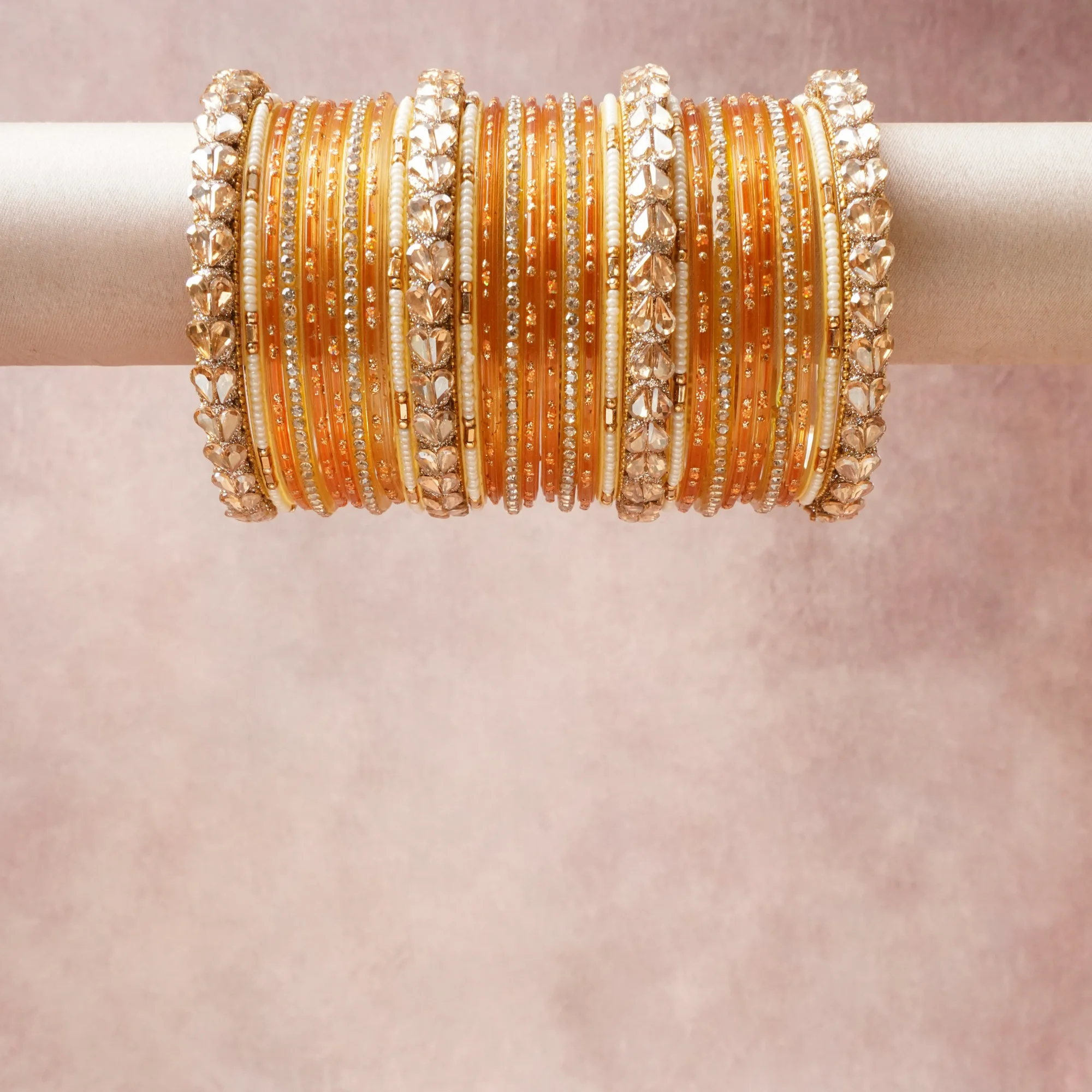 A grounding Mustard Yellow forms the heart of the set, while touches of  add charm.

A thoughtful composition of Glass, Crystal, Faux Pearl, Opaque Glass, Gold-Toned Metal Alloy, designed to feel complete without being heavy.
Each element layers seamlessly, creating a look that is refined, wearable and quietly striking.