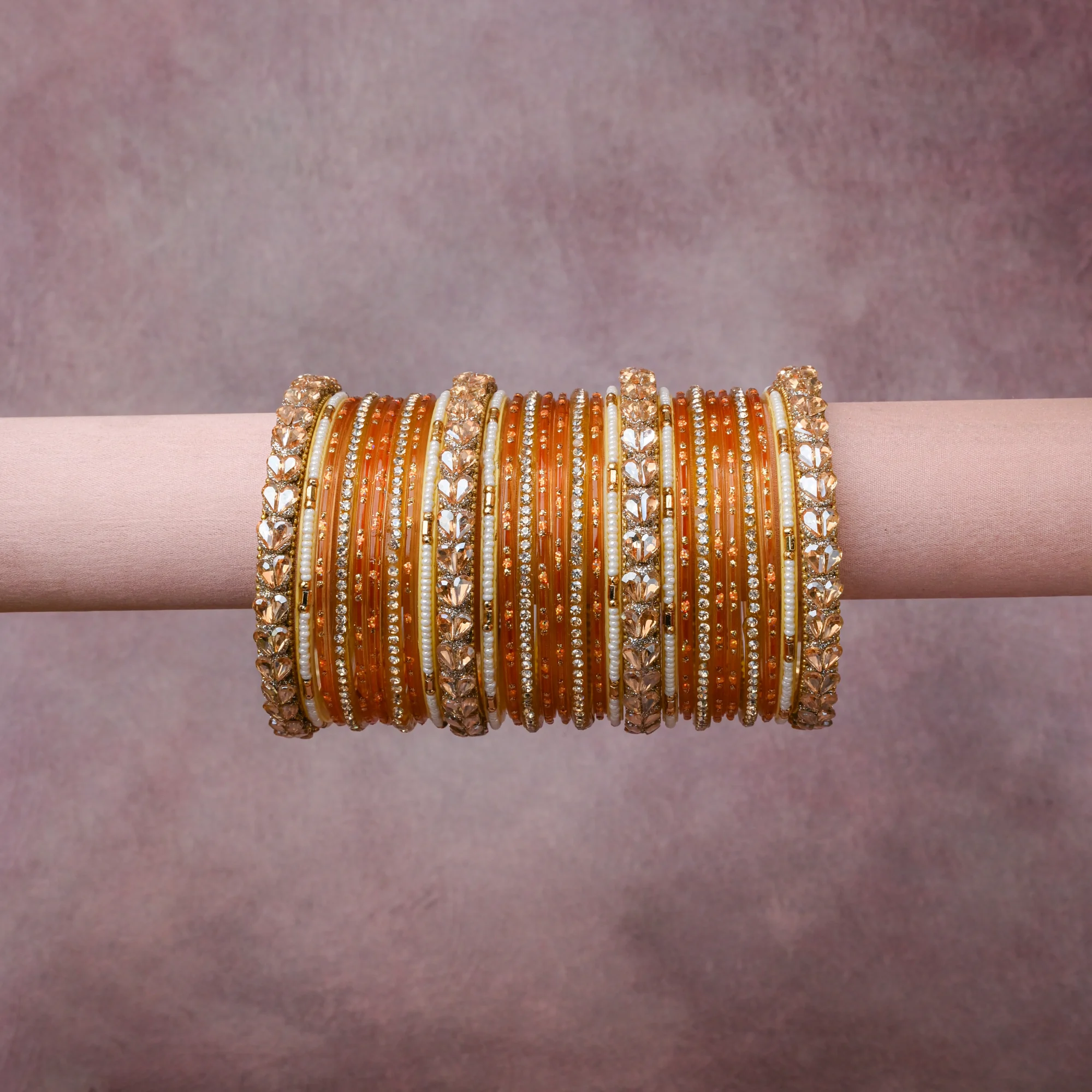 A grounding Mustard Yellow forms the heart of the set, while touches of  add charm.

A thoughtful composition of Glass, Crystal, Faux Pearl, Opaque Glass, Gold-Toned Metal Alloy, designed to feel complete without being heavy.
Each element layers seamlessly, creating a look that is refined, wearable and quietly striking.