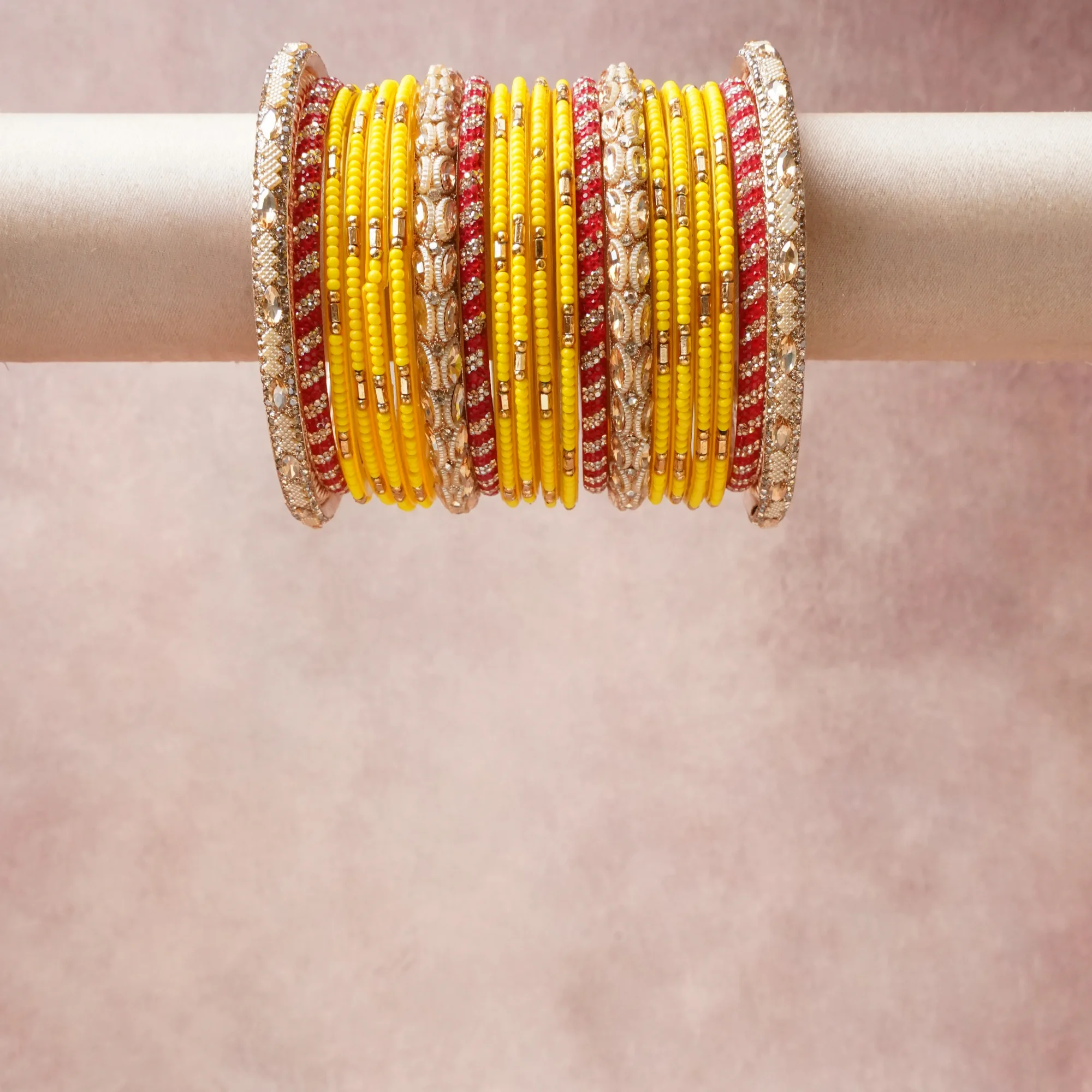 A grounding Vibrant Yellow forms the heart of the set, while touches of Clear Crystal, Rose Gold, Warm Gold, Cream Pearl add charm.

A thoughtful composition of Lacquer/Resin, Glass, Rhinestone, Faux Pearl, Gold-tone Metal Alloy, designed to feel complete without being heavy.
Each element layers seamlessly, creating a look that is refined, wearable and quietly striking.