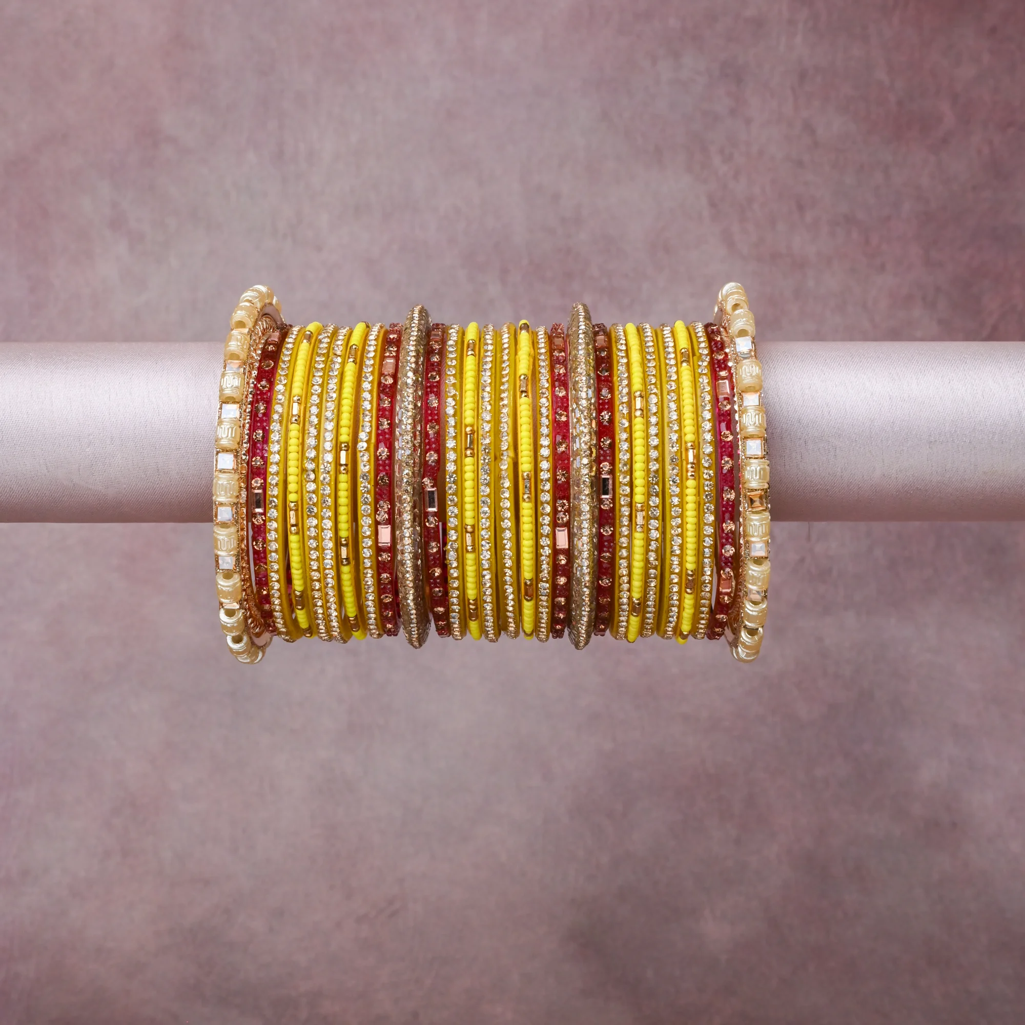 A grounding Vibrant Yellow forms the heart of the set, while touches of Clear Crystal, Rose Gold, Warm Gold, Cream Pearl add charm.

A thoughtful composition of Lacquer/Resin, Glass, Rhinestone, Faux Pearl, Gold-tone Metal Alloy, designed to feel complete without being heavy.
Each element layers seamlessly, creating a look that is refined, wearable and quietly striking.