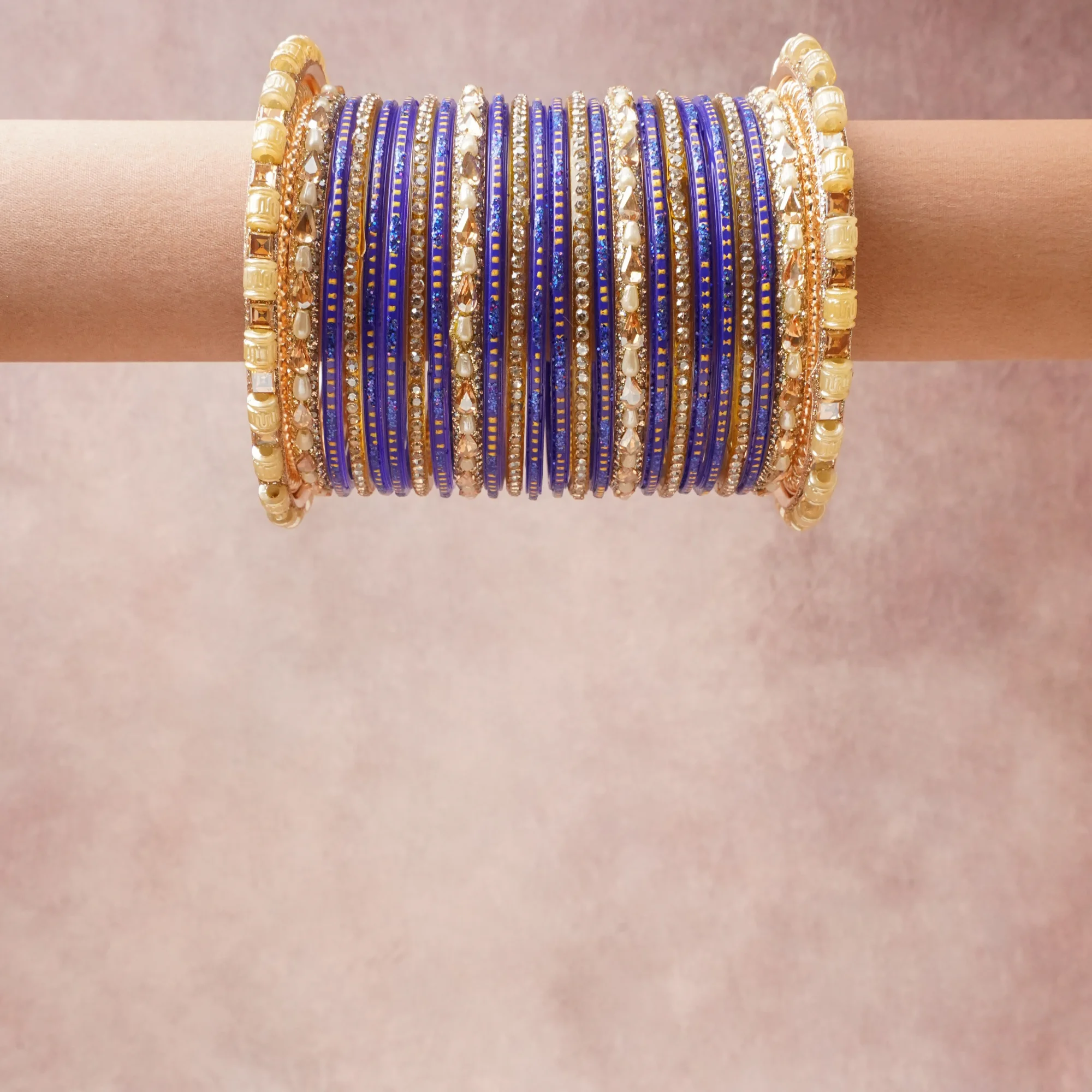A grounding Cobalt Blue forms the heart of the set, while touches of Clear Crystal, Ivory Pearl, Saffron Yellow add charm.

A thoughtful composition of Glass, Gold-Toned Metal Alloy, Rhinestone, Imitation Pearl, Acrylic Crystal, designed to feel complete without being heavy.
Each element layers seamlessly, creating a look that is refined, wearable and quietly striking.