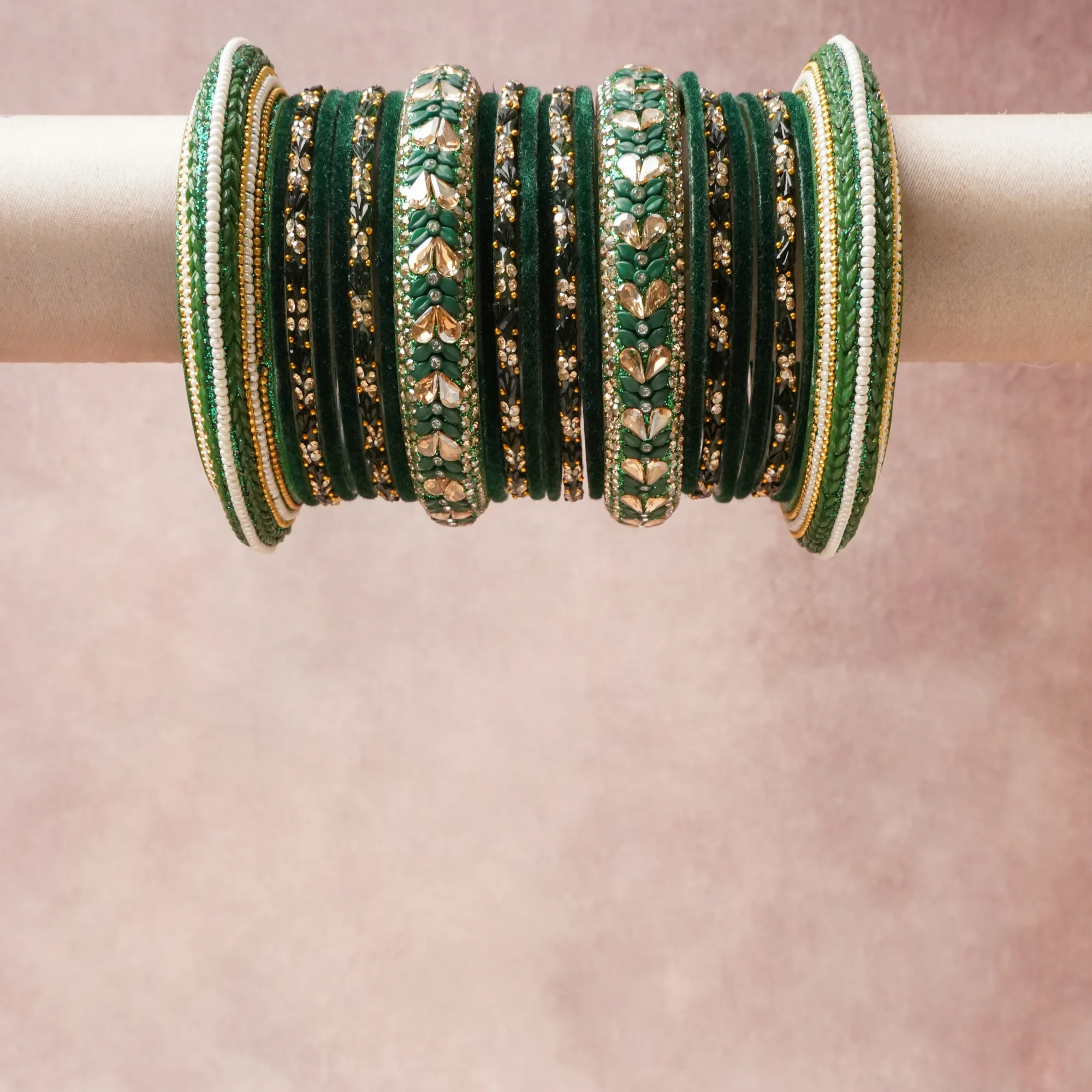 A grounding Deep Forest Green forms the heart of the set, while touches of Gold, Clear, White, Light Emerald Green, Champagne, Black add charm.

A thoughtful composition of Velvet, Gold-toned Metal, Glass Rhinestones, Enamel, Glass Beads, Textile Thread, designed to feel complete without being heavy.
Each element layers seamlessly, creating a look that is refined, wearable and quietly striking.