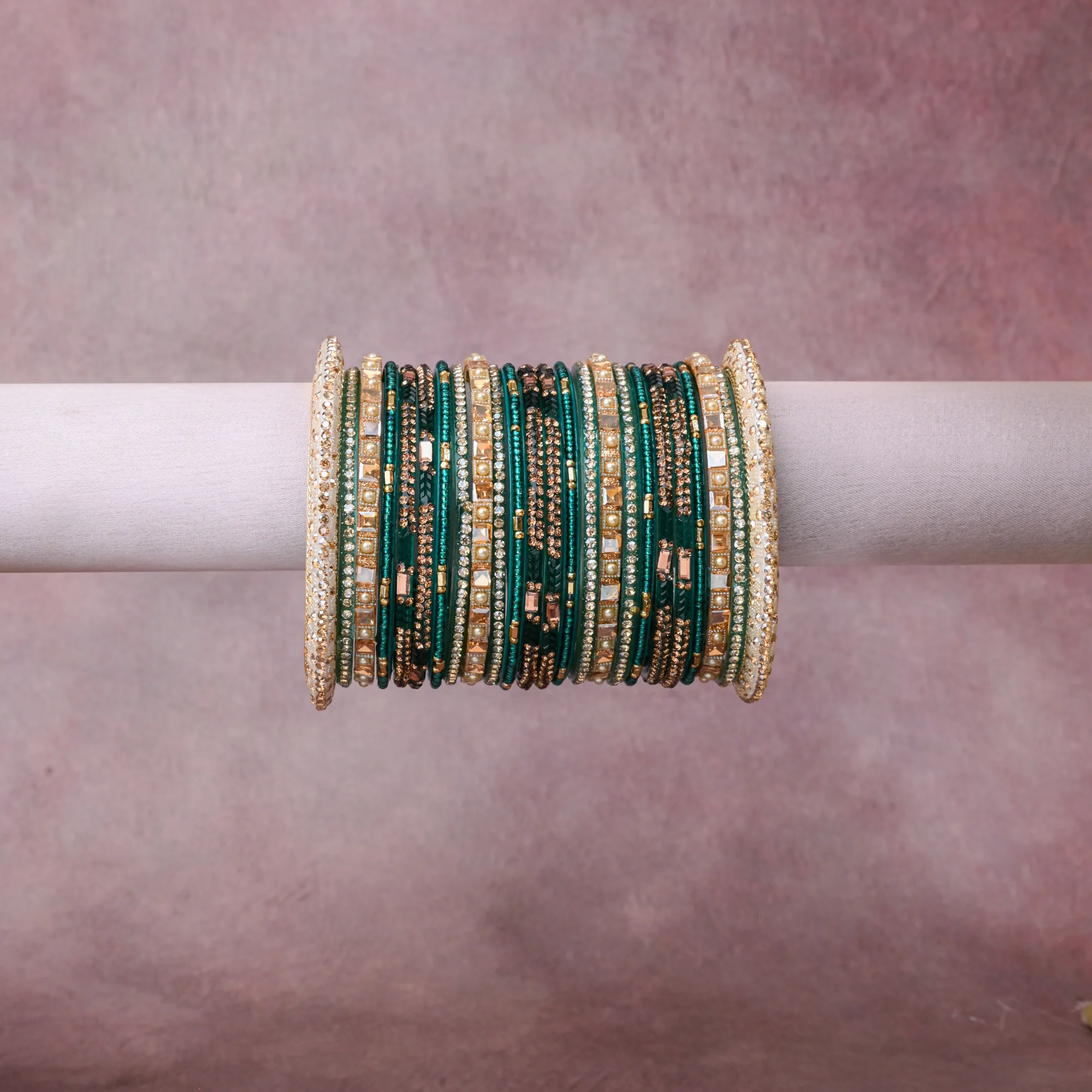 A grounding Emerald Green forms the heart of the set, while touches of Gold, Pearl White, Crystal Clear add charm.

A thoughtful composition of Metal Alloy, Crystals, Faux Pearls, Enamel, designed to feel complete without being heavy.
Each element layers seamlessly, creating a look that is refined, wearable and quietly striking.