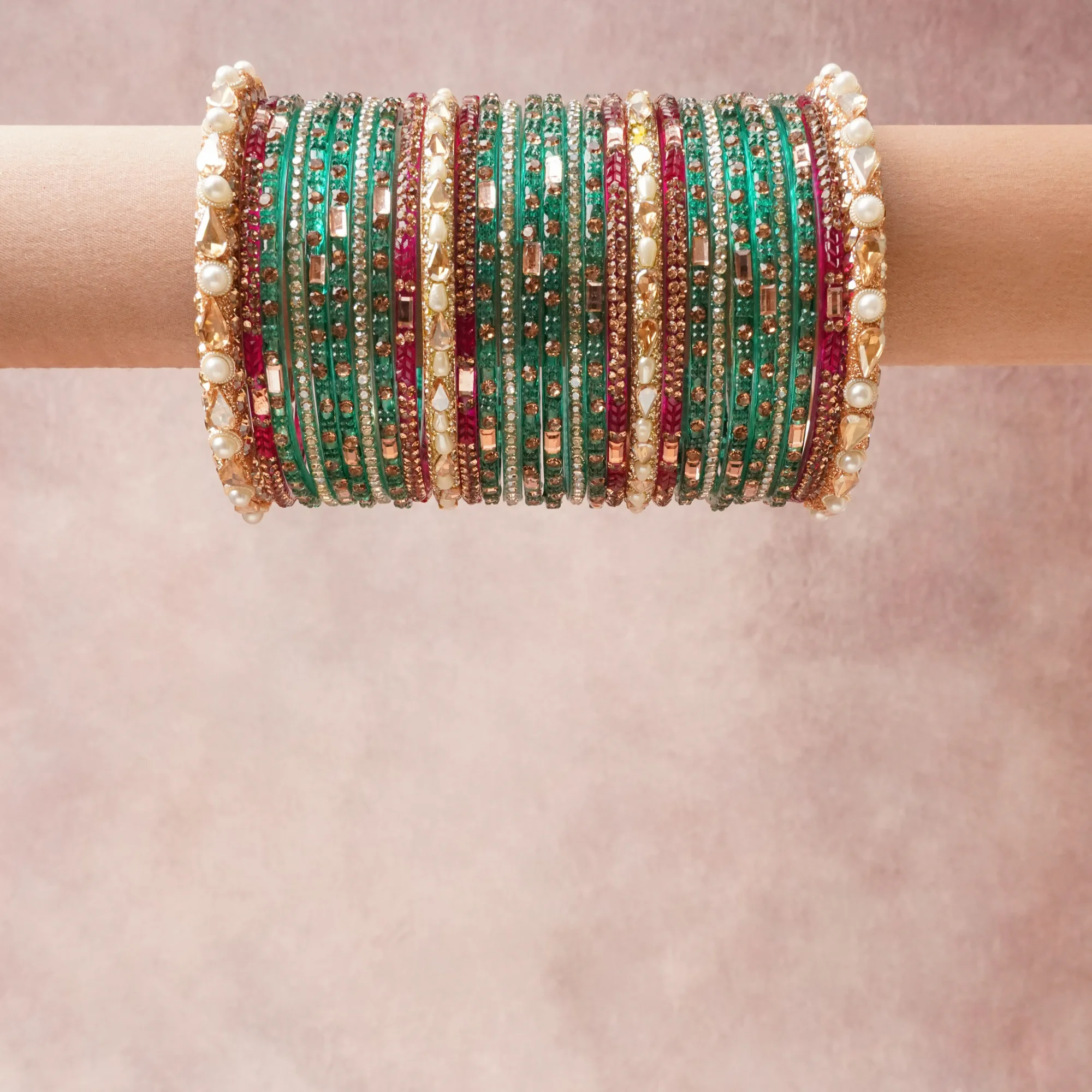 A grounding Deep Emerald Green forms the heart of the set, while touches of Ruby Red, Antique Gold, Rose Gold, Diamond White add charm.

A thoughtful composition of Metal Alloy, Glass, Cubic Zirconia, Faux Pearl, designed to feel complete without being heavy.
Each element layers seamlessly, creating a look that is refined, wearable and quietly striking.