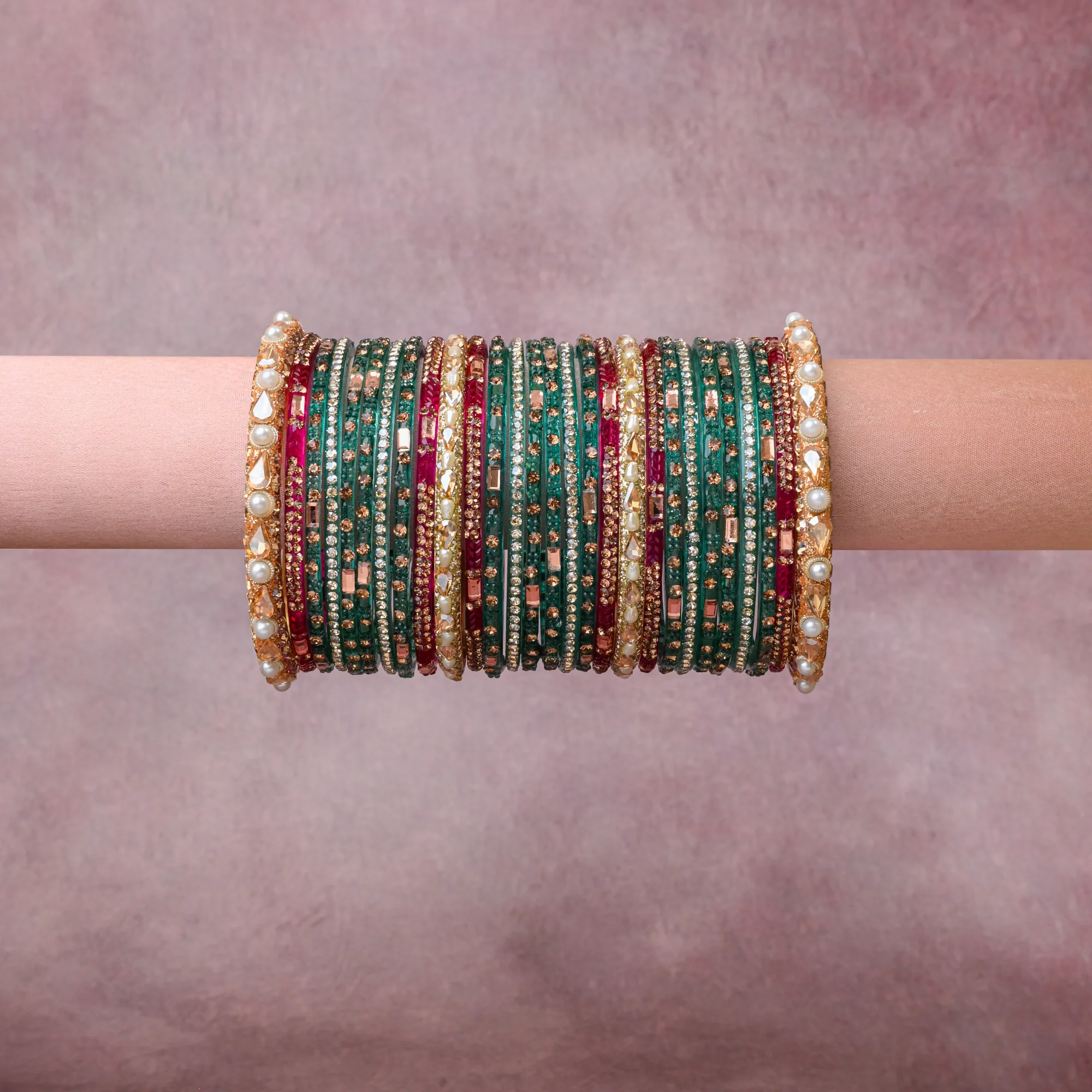 A grounding Deep Emerald Green forms the heart of the set, while touches of Ruby Red, Antique Gold, Rose Gold, Diamond White add charm.

A thoughtful composition of Metal Alloy, Glass, Cubic Zirconia, Faux Pearl, designed to feel complete without being heavy.
Each element layers seamlessly, creating a look that is refined, wearable and quietly striking.