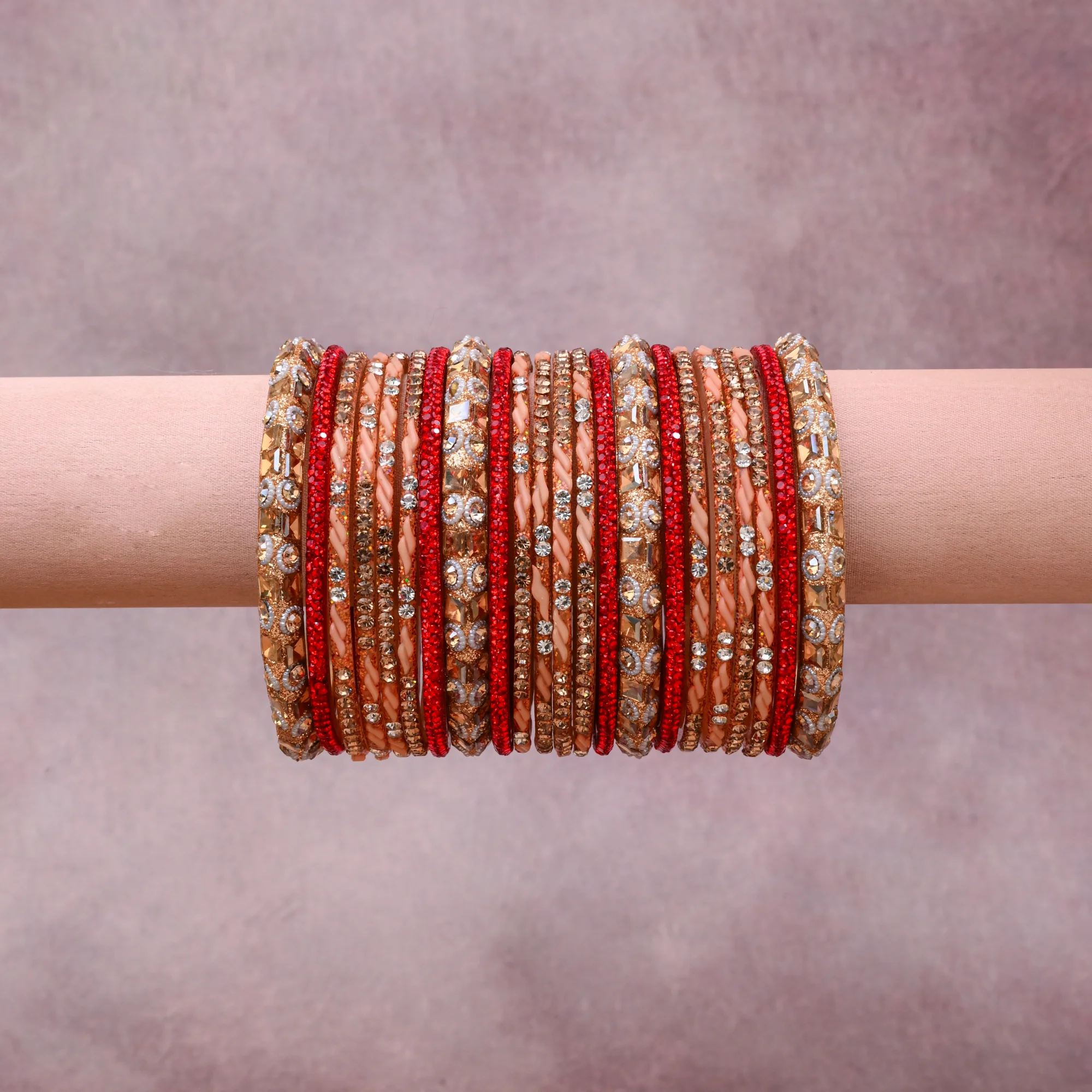 A grounding Peach forms the heart of the set, while touches of Vibrant Red, Clear Crystal, Champagne Gold, Cream add charm.

A thoughtful composition of Metal Alloy (Gold-toned), Glass Rhinestones, Glitter Embellishment, Silk Thread, Lacquer/Resin, designed to feel complete without being heavy.
Each element layers seamlessly, creating a look that is refined, wearable and quietly striking.