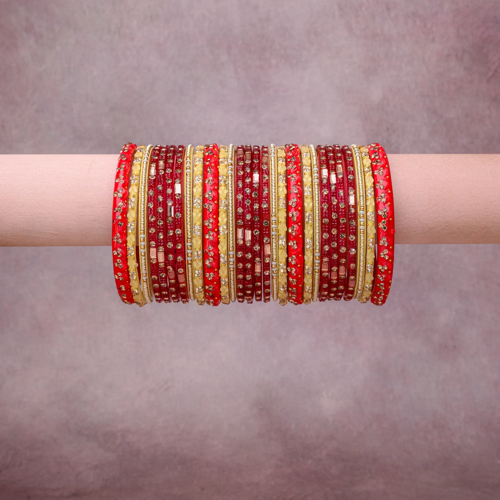 A grounding Deep Crimson forms the heart of the set, while touches of Clear Crystal, Metallic Gold, Ivory add charm.

A thoughtful composition of Glass, Rhinestone, Gold-Toned Metal, Textile, designed to feel complete without being heavy.
Each element layers seamlessly, creating a look that is refined, wearable and quietly striking.