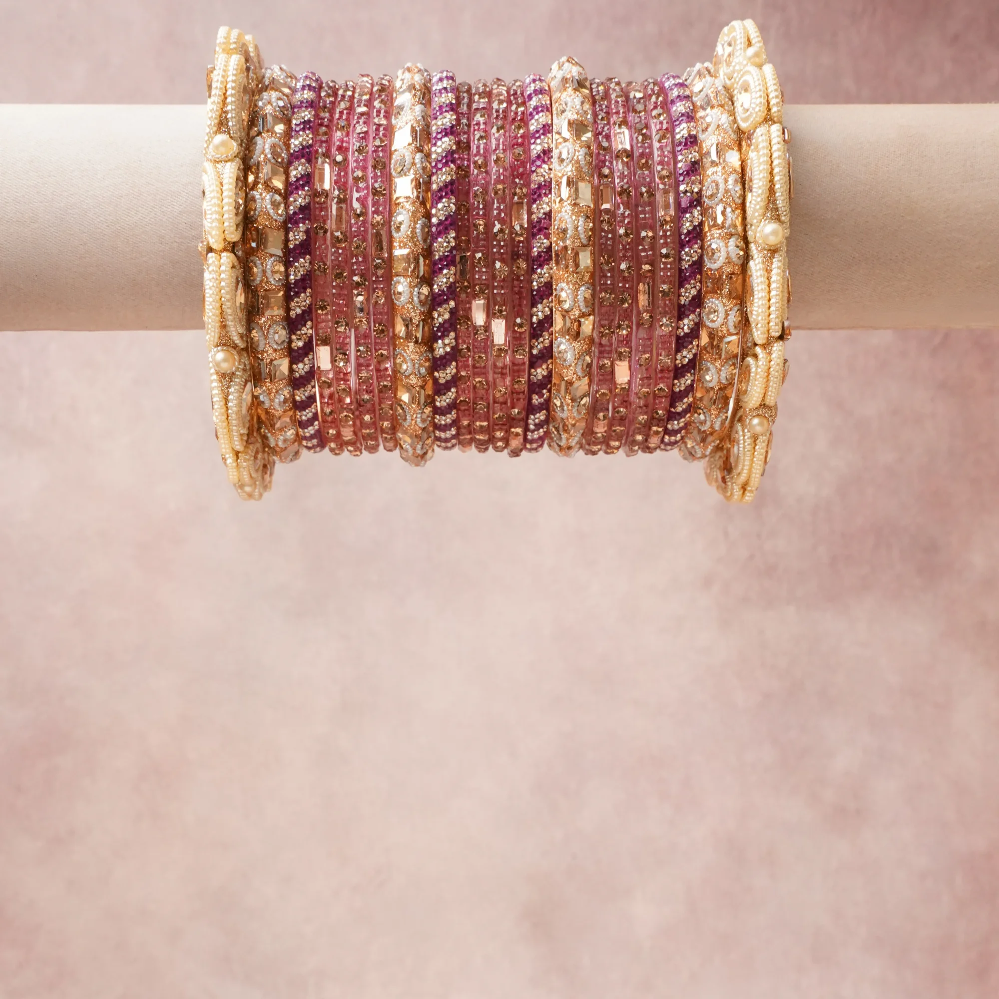 A grounding Purple forms the heart of the set, while touches of Diamond White, Ivory Pearl add charm.

A thoughtful composition of Glass, Gold-plated Alloy, Crystal, Faux Pearl, designed to feel complete without being heavy.
Each element layers seamlessly, creating a look that is refined, wearable and quietly striking.