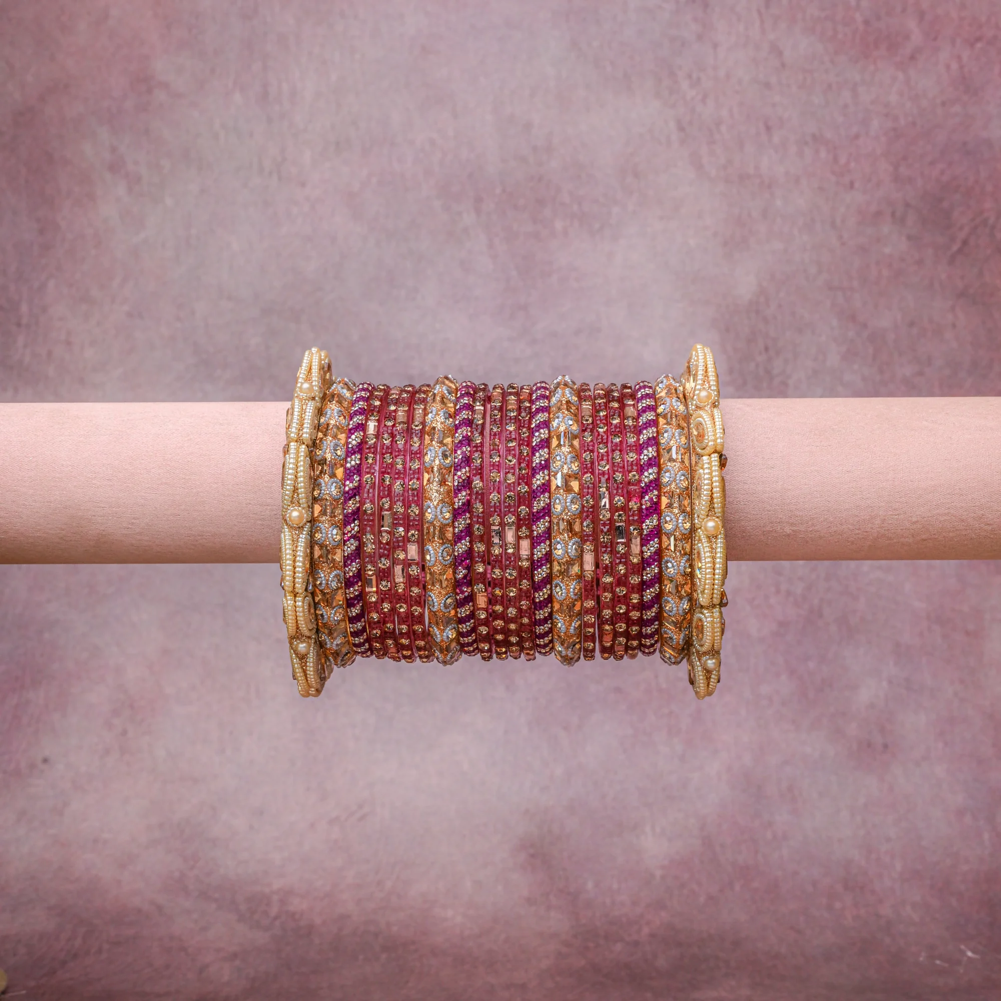 A grounding Purple forms the heart of the set, while touches of Diamond White, Ivory Pearl add charm.

A thoughtful composition of Glass, Gold-plated Alloy, Crystal, Faux Pearl, designed to feel complete without being heavy.
Each element layers seamlessly, creating a look that is refined, wearable and quietly striking.