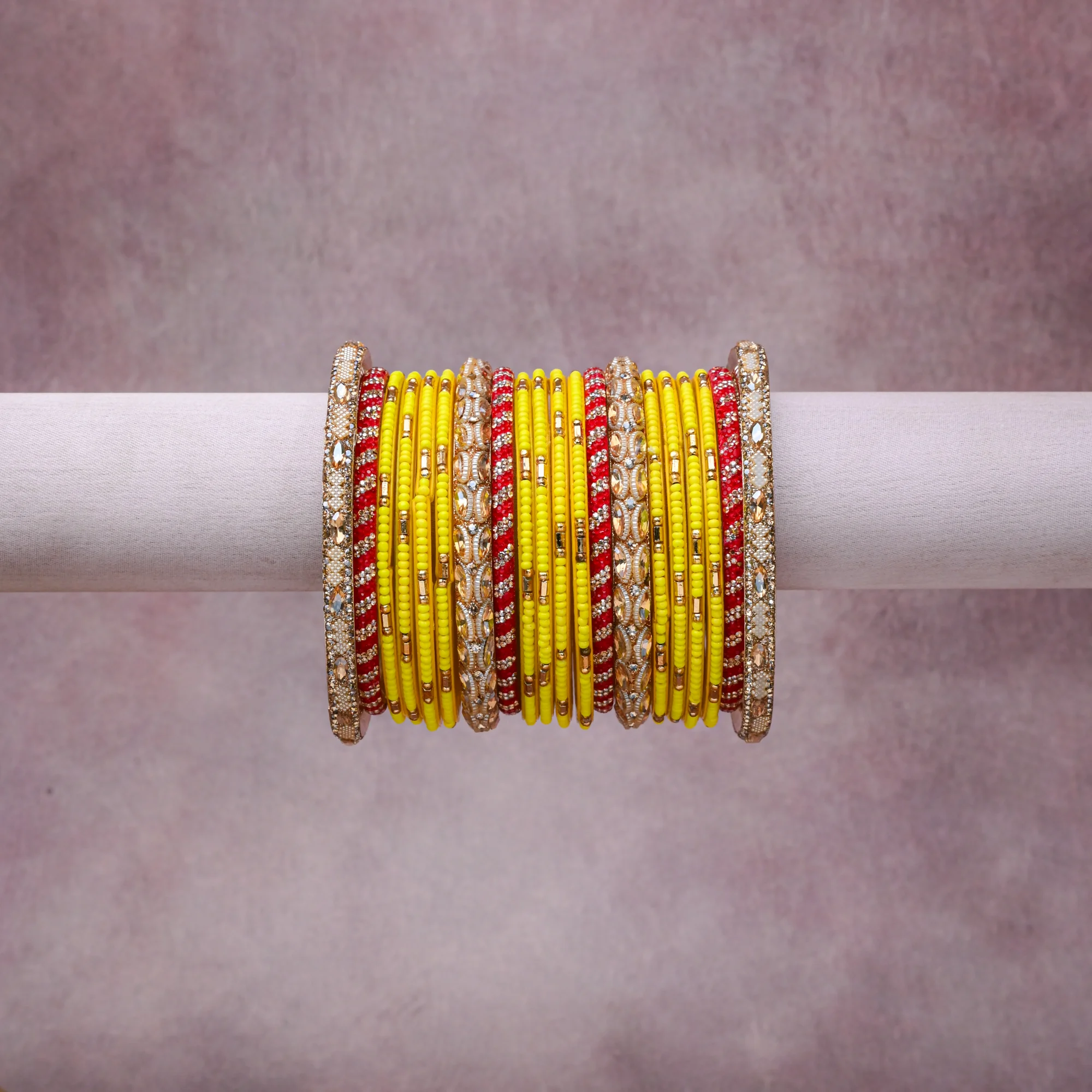 A grounding Vibrant Yellow forms the heart of the set, while touches of Glistening Gold, Brilliant Clear, Opaque White add charm.

A thoughtful composition of Glass, Gold-toned Metal Alloy, Crystal Rhinestones, Glass Seed Beads, designed to feel complete without being heavy.
Each element layers seamlessly, creating a look that is refined, wearable and quietly striking.