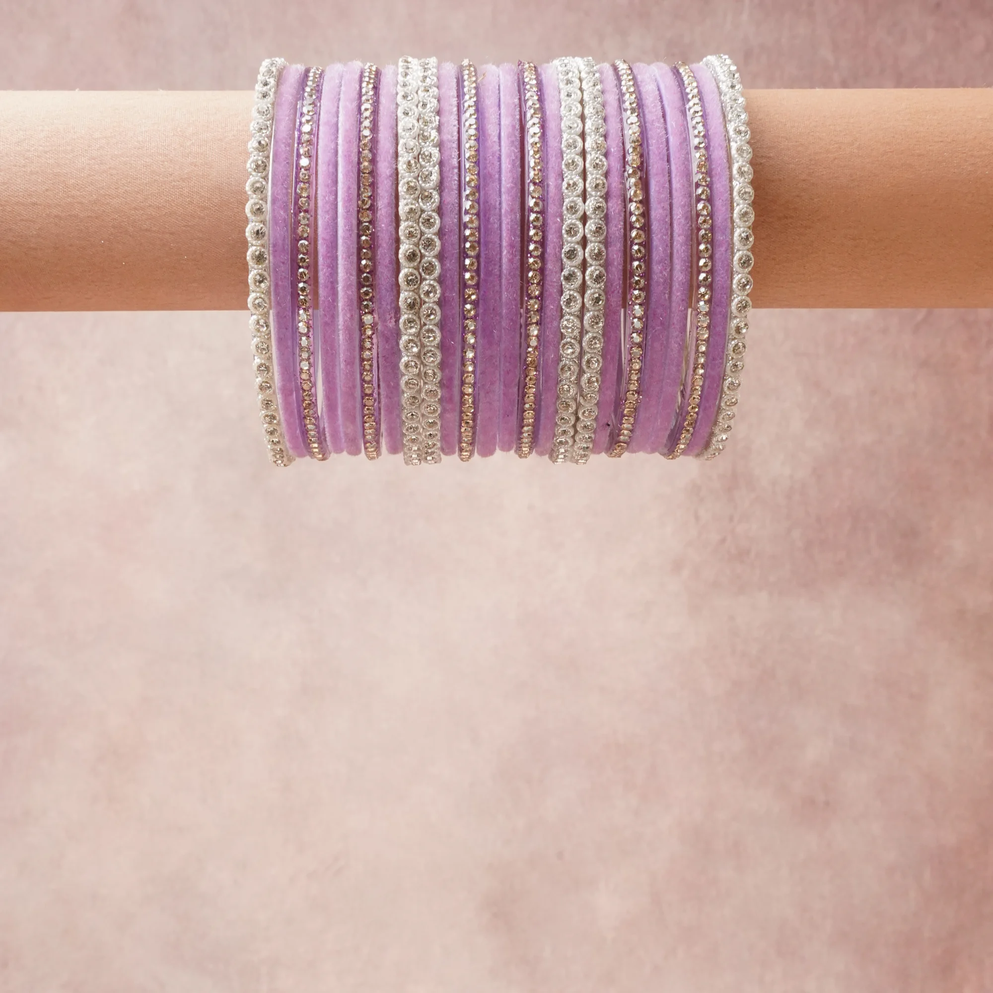 A grounding Lavender forms the heart of the set, while touches of Silver, Gold add charm.

A thoughtful composition of Velvet Fabric, Glass, Metal Alloy, Rhinestone Crystals, designed to feel complete without being heavy.
Each element layers seamlessly, creating a look that is refined, wearable and quietly striking.