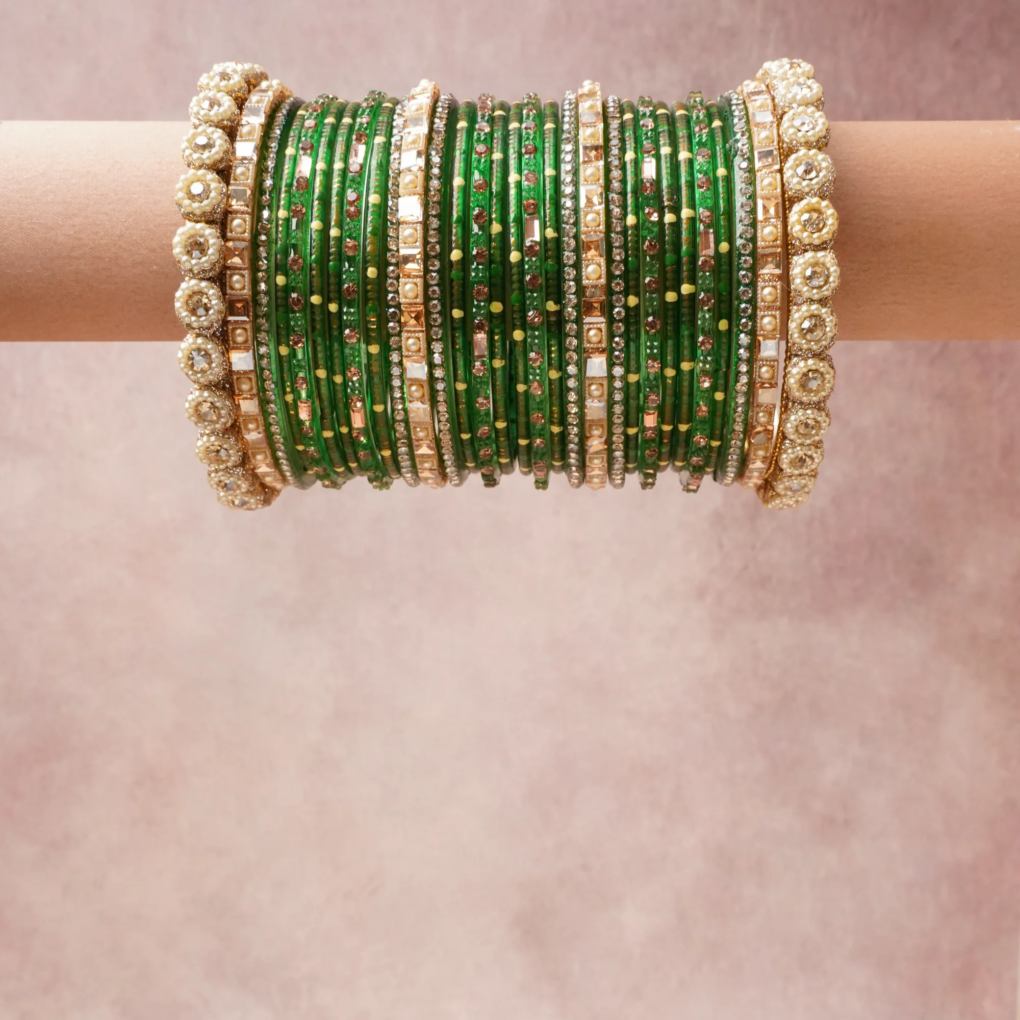 A grounding Emerald Green forms the heart of the set, while touches of Gold, Ivory, Clear, Rose Pink, Chartreuse add charm.

A thoughtful composition of Glass, Metal Alloy, Imitation Pearl, Rhinestone, designed to feel complete without being heavy.
Each element layers seamlessly, creating a look that is refined, wearable and quietly striking.