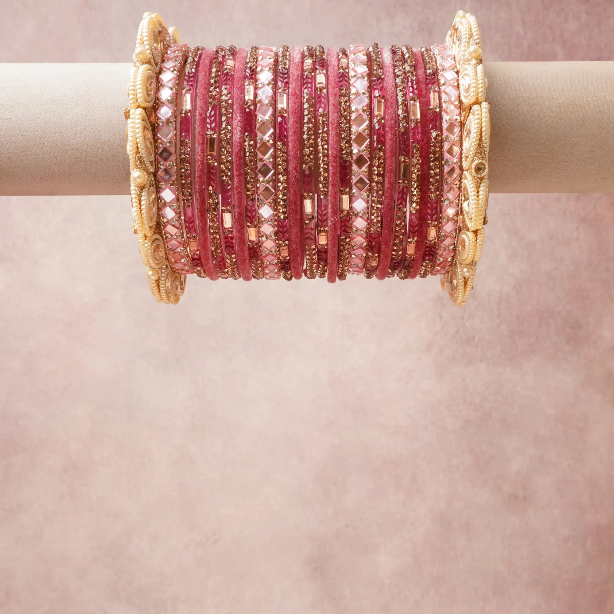 A grounding Deep Rose forms the heart of the set, while touches of Warm Gold, Peach, Cream, Iridescent add charm.

A thoughtful composition of Gold-Toned Alloy, Velvet, Glass Rhinestones, Faux Pearls, designed to feel complete without being heavy.
Each element layers seamlessly, creating a look that is refined, wearable and quietly striking.