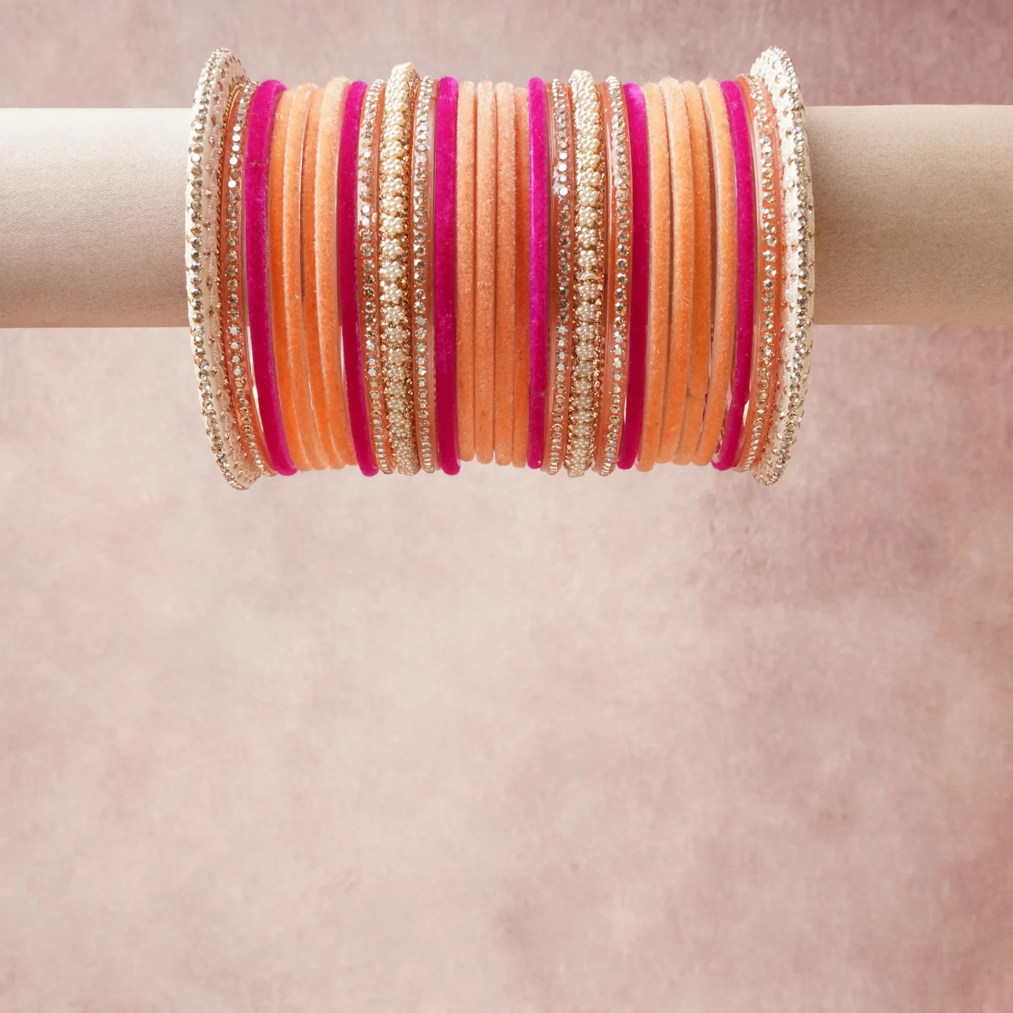 A grounding Peach forms the heart of the set, while touches of Clear, Off-White, Gold add charm.

A thoughtful composition of Velvet Fabric, Metal Alloy, Glass Rhinestone, Faux Pearl, Enamel, designed to feel complete without being heavy.
Each element layers seamlessly, creating a look that is refined, wearable and quietly striking.