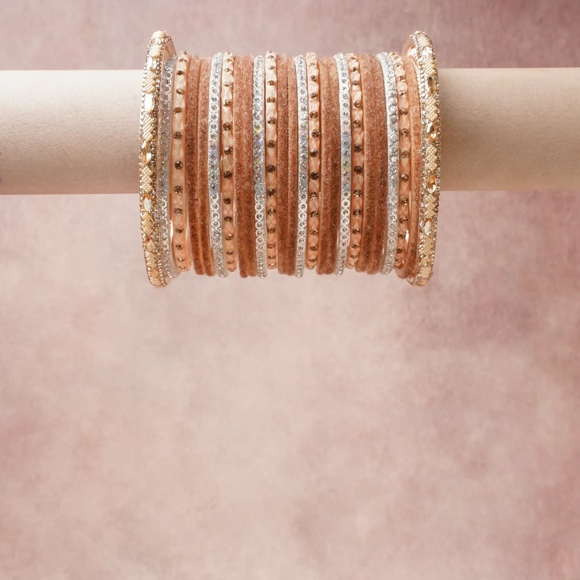 A grounding Rose Gold forms the heart of the set, while touches of Clear Crystal, Champagne Crystal, White Pearl add charm.

A thoughtful composition of Rose Gold Plated Metal, Textile, Cubic Zirconia/Crystal, Simulated Pearl, designed to feel complete without being heavy.
Each element layers seamlessly, creating a look that is refined, wearable and quietly striking.