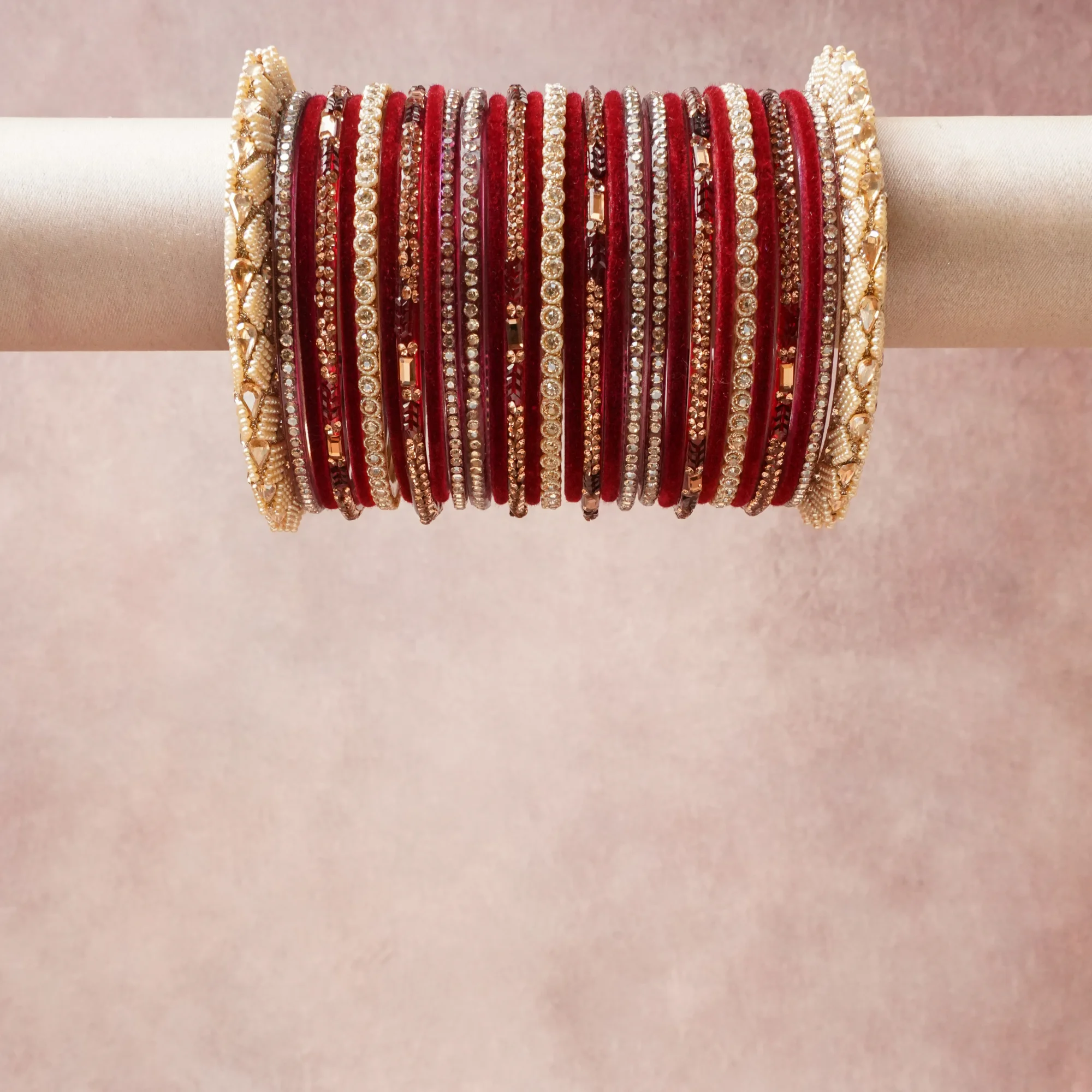 A grounding Deep Crimson Red forms the heart of the set, while touches of Cream, Antique Gold, Clear Crystal add charm.

A thoughtful composition of Metal Alloy, Lacquered Finish, Seed Pearls, Crystal Embellishments, Gold-toned Metal, designed to feel complete without being heavy.
Each element layers seamlessly, creating a look that is refined, wearable and quietly striking.