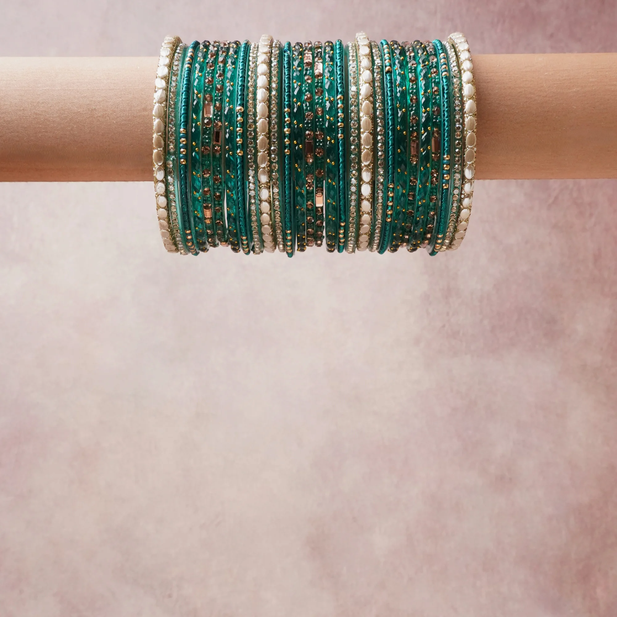 A grounding Teal forms the heart of the set, while touches of Cream, Gold, Brown add charm.

A thoughtful composition of Silk thread, rhinestones, faux pearls, designed to feel complete without being heavy.
Each element layers seamlessly, creating a look that is refined, wearable and quietly striking.