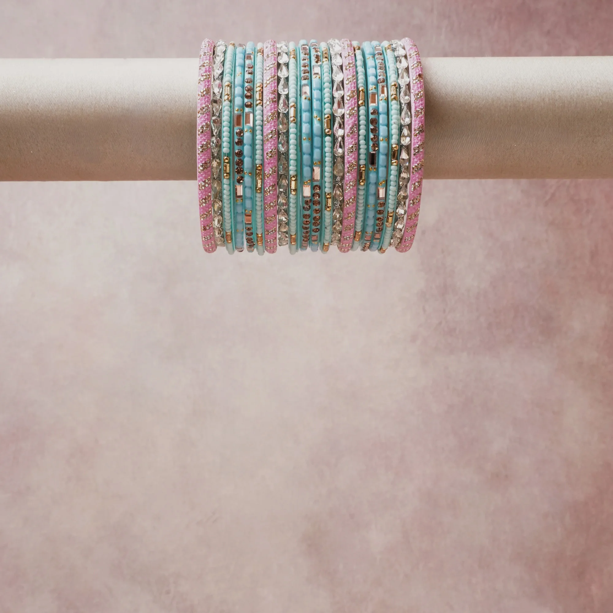 A grounding aqua blue forms the heart of the set, while touches of blush pink, silver, gold add charm.

A thoughtful composition of beaded crystal, rhinestone, metal, designed to feel complete without being heavy.
Each element layers seamlessly, creating a look that is refined, wearable and quietly striking.