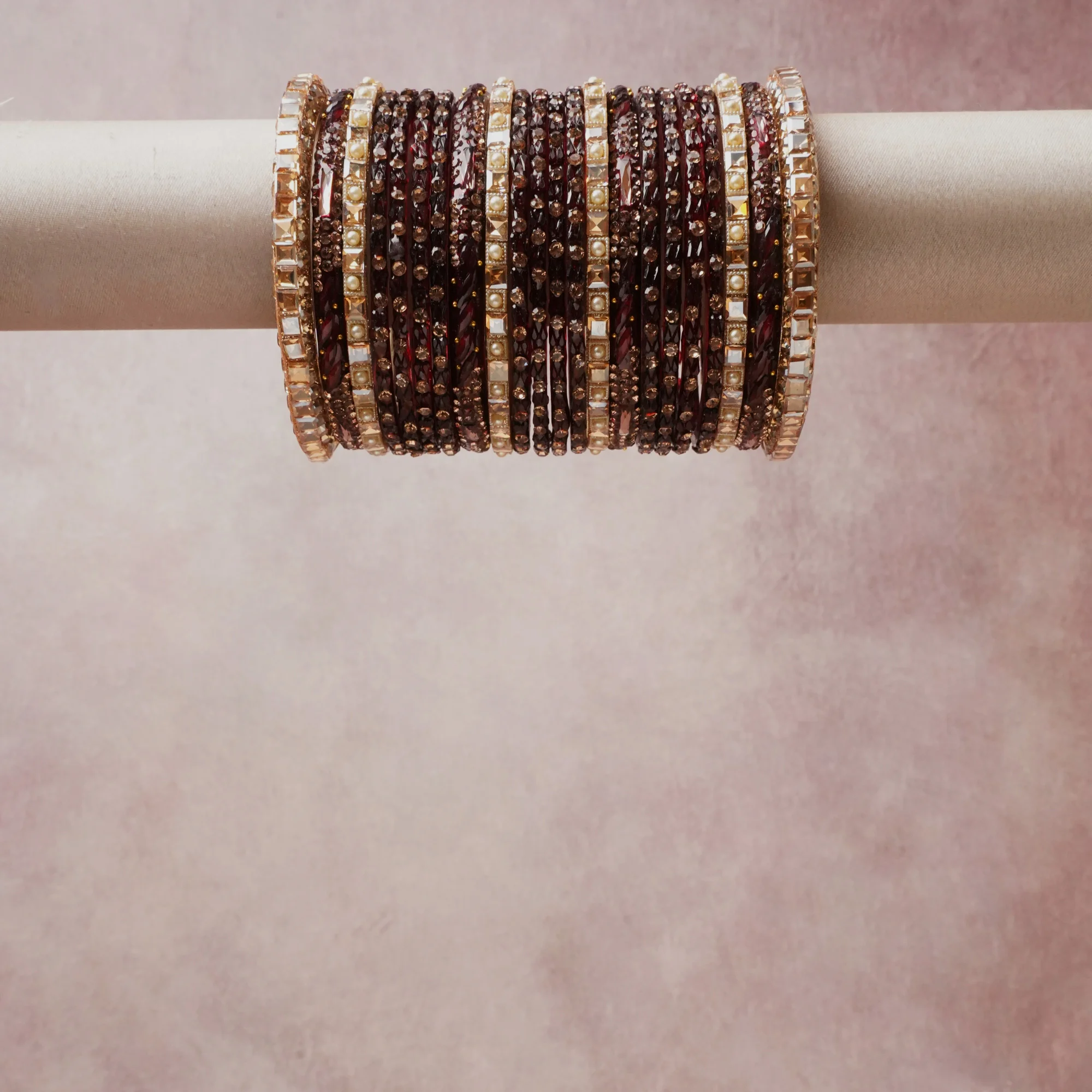 A grounding burgundy forms the heart of the set, while touches of rose gold, champagne gold add charm.

A thoughtful composition of glass crystal beads, metal alloy, faux pearls, designed to feel complete without being heavy.
Each element layers seamlessly, creating a look that is refined, wearable and quietly striking.