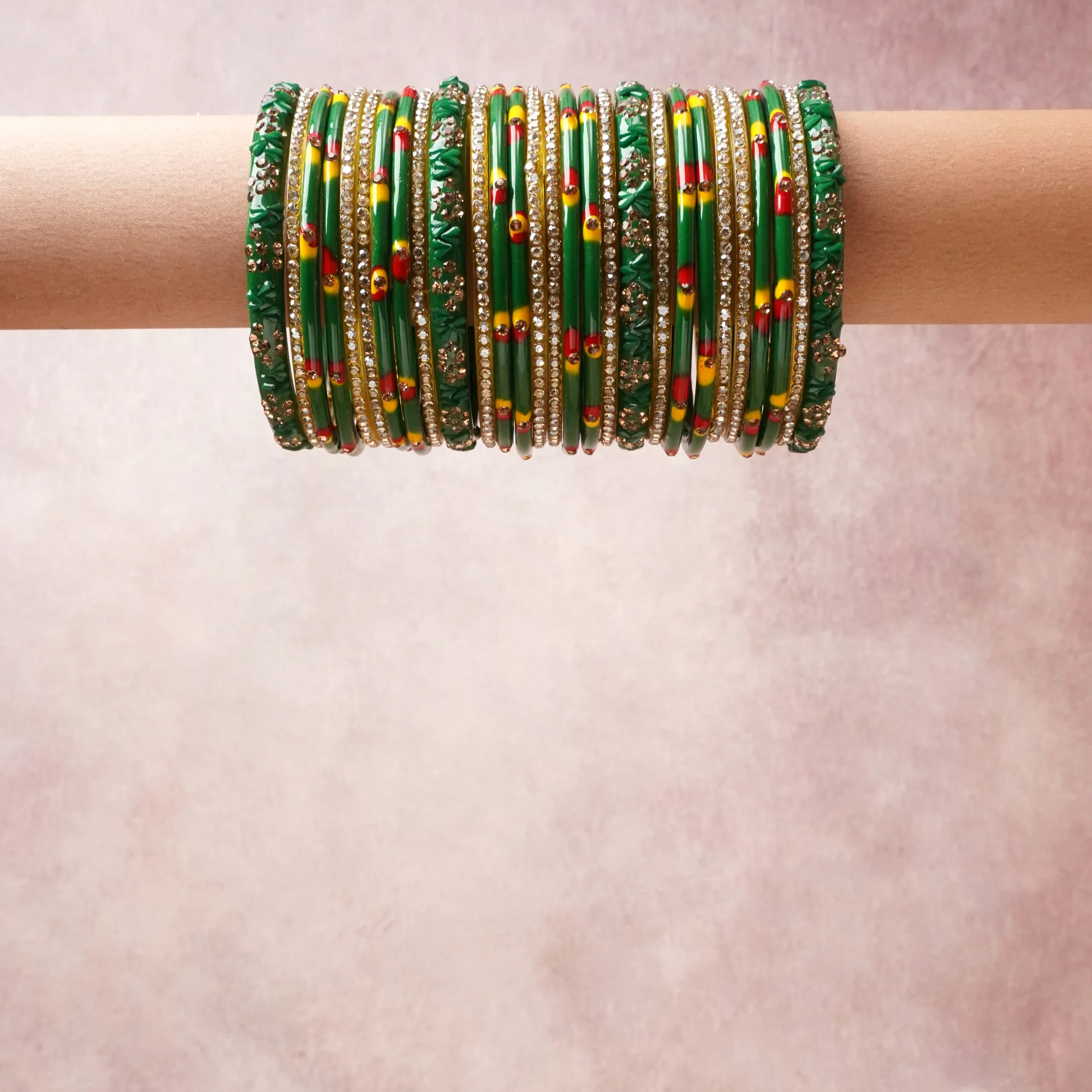 A grounding Green forms the heart of the set, while touches of Gold, Red, Yellow add charm.

A thoughtful composition of Glass, rhinestone, metal, designed to feel complete without being heavy.
Each element layers seamlessly, creating a look that is refined, wearable and quietly striking.