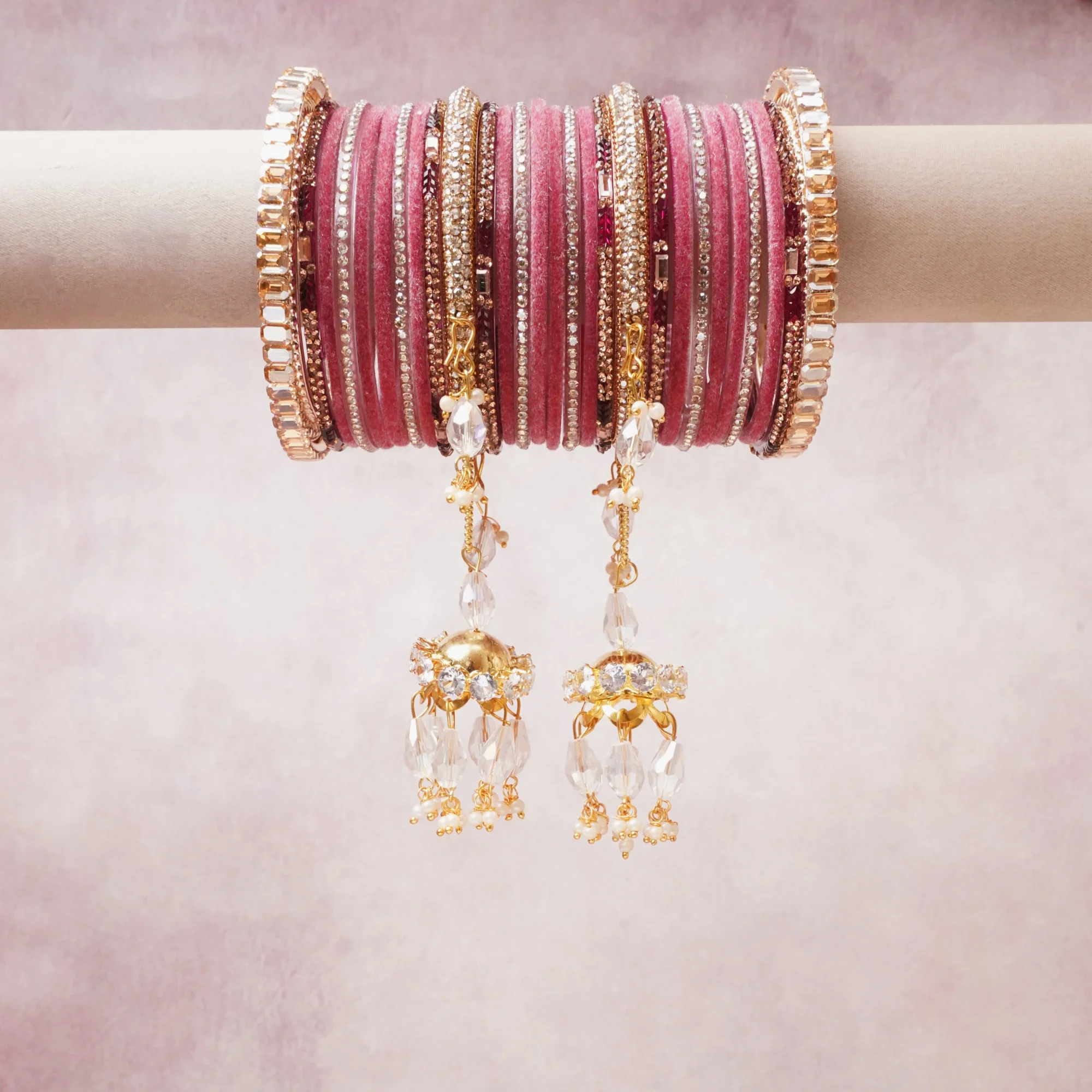 A majestic blush pink set, complemented by gold, crystal white, rose gold featuring glass bangles, gold-tone metal, rhinestones.
Rich, ceremonial, and designed to be passed through generations.
