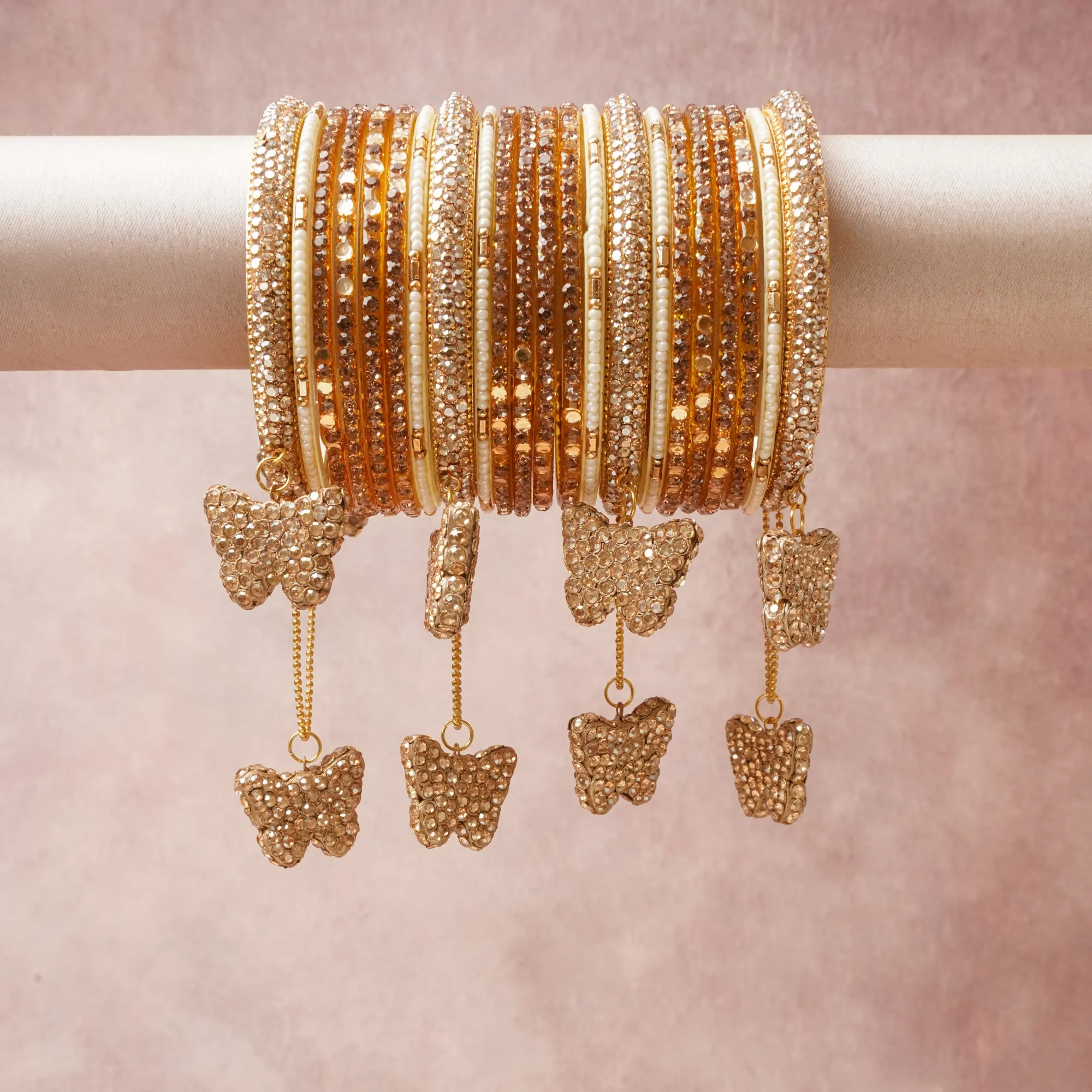 A commanding Gold anchors this beautiful set, enriched with accents of Ivory that add depth and dimension.

Featuring a striking composition of Gold-toned Alloy, Rhinestones, Seed Beads, Polymer, this set carries intricate craftsmanship and strong presence. Grand in form, it is created for moments that deserve to be marked.