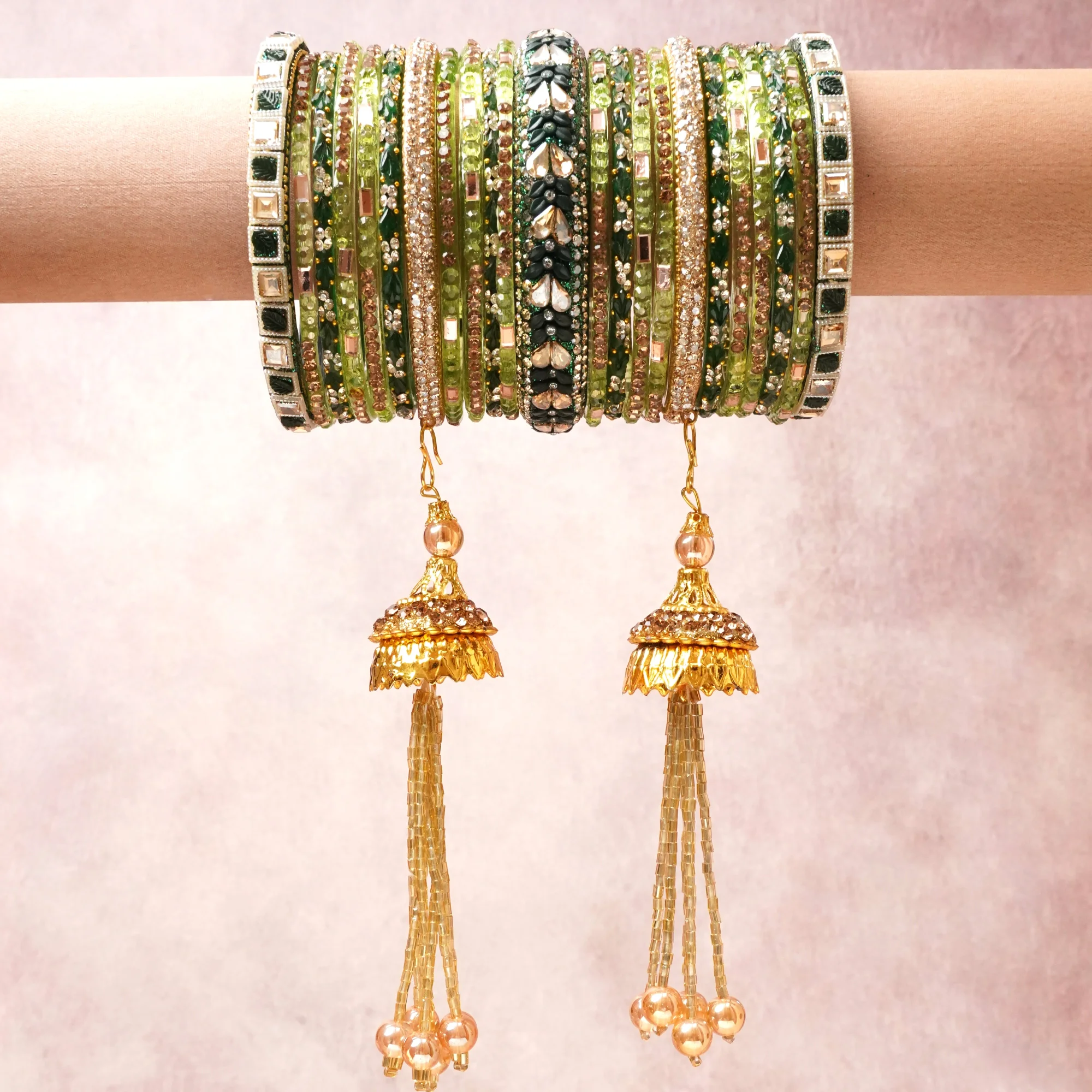 A commanding green anchors this beautiful set, enriched with accents of gold, champagne, black that add depth and dimension.

Featuring a striking composition of beaded metal, this set carries intricate craftsmanship and strong presence. Grand in form, it is created for moments that deserve to be marked.