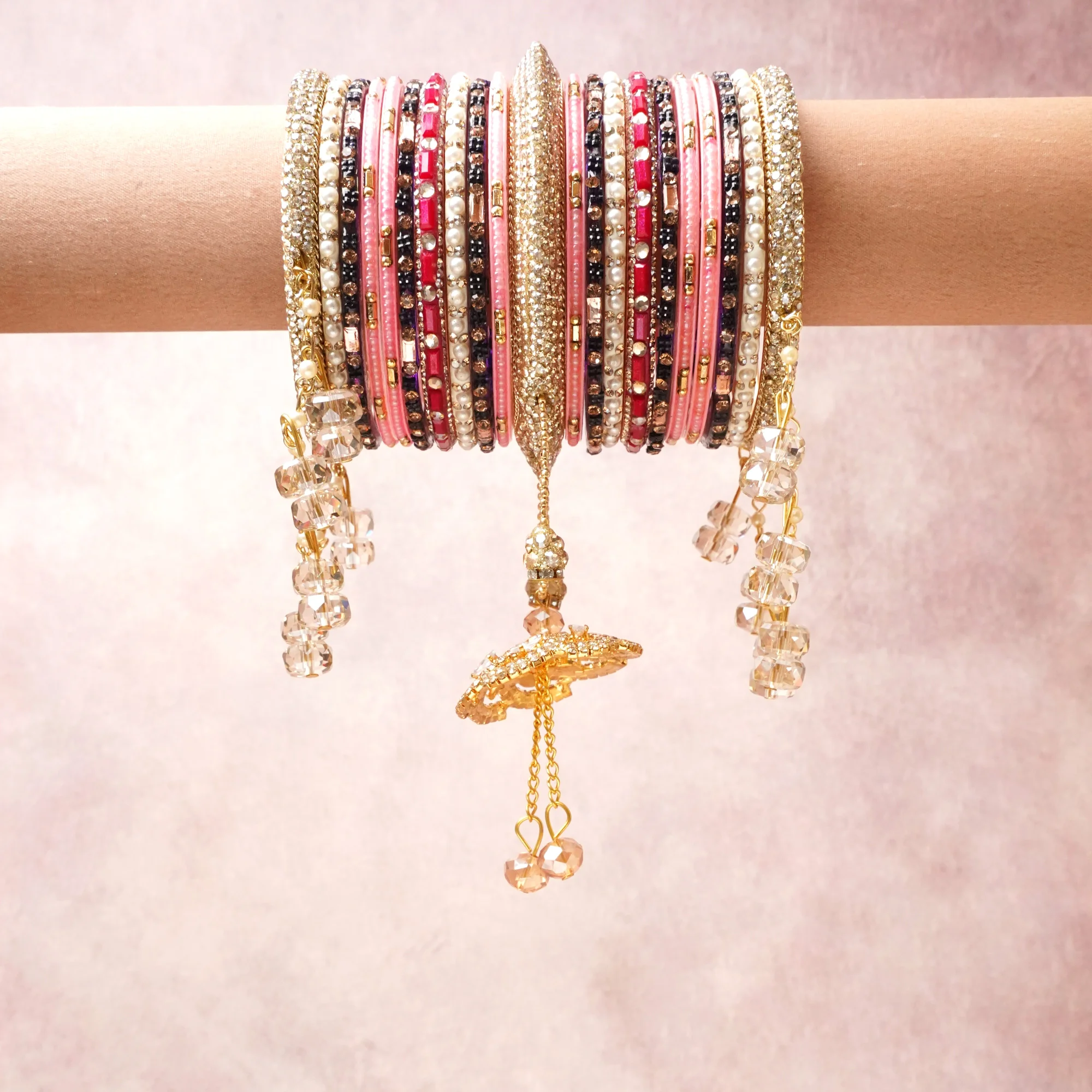 A commanding Gold anchors this beautiful set, enriched with accents of Pink, Pearl White that add depth and dimension.

Featuring a striking composition of Metal, Beads, Rhinestones, this set carries intricate craftsmanship and strong presence. Grand in form, it is created for moments that deserve to be marked.