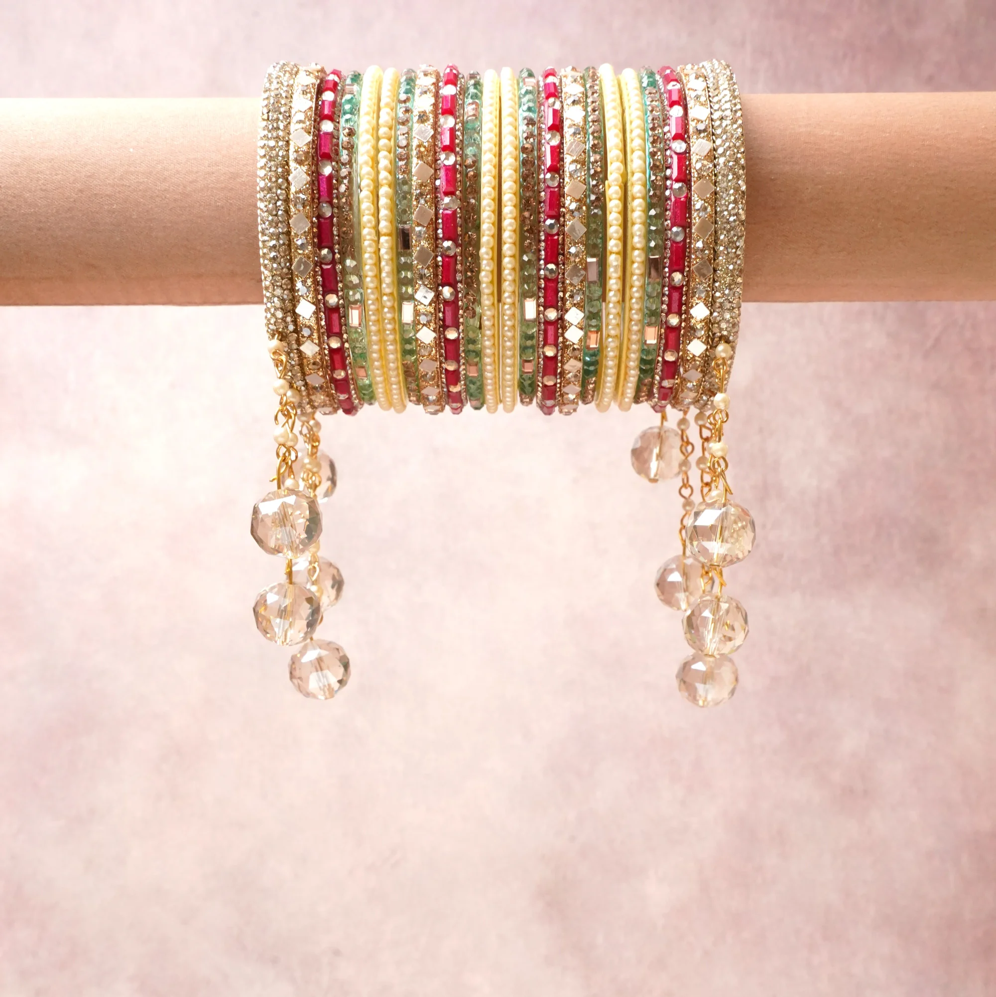 A commanding gold anchors this beautiful set, enriched with accents of ivory, red that add depth and dimension.

Featuring a striking composition of crystal beads, faux pearls, gold-tone metal, this set carries intricate craftsmanship and strong presence. Grand in form, it is created for moments that deserve to be marked.