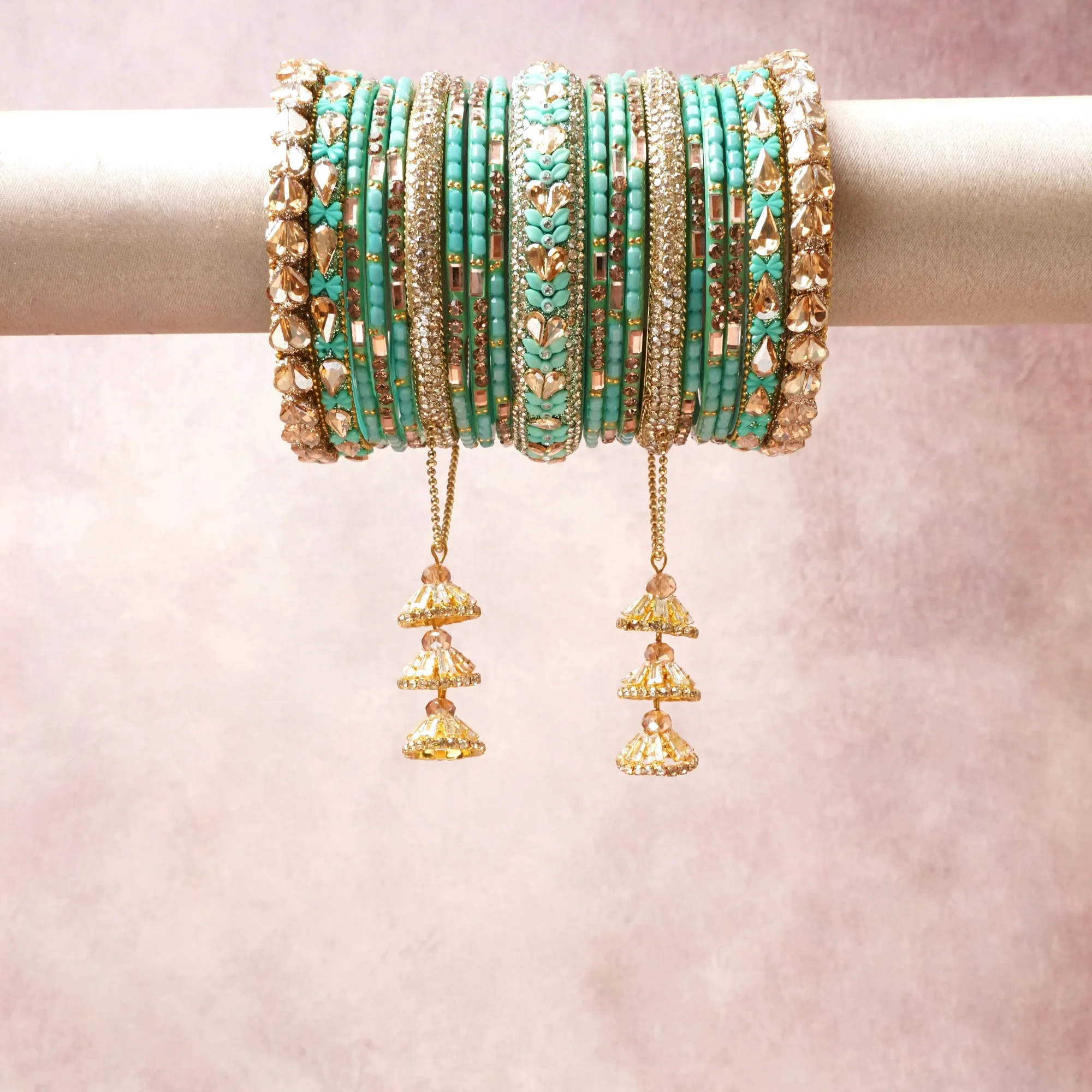 A commanding Turquoise anchors this beautiful set, enriched with accents of Gold, Champagne that add depth and dimension.

Featuring a striking composition of beaded metal and crystal, this set carries intricate craftsmanship and strong presence. Grand in form, it is created for moments that deserve to be marked.