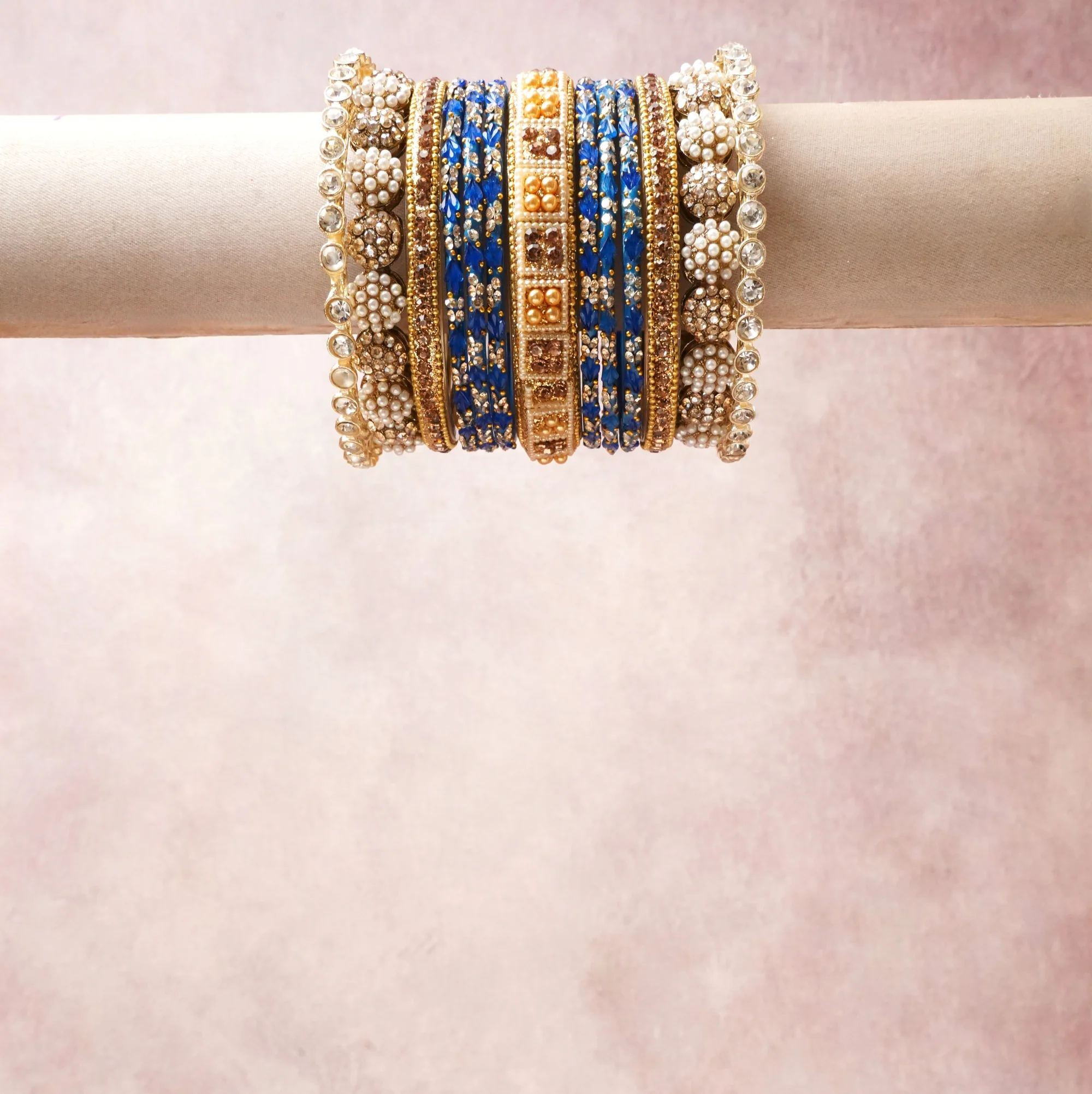 A commanding Royal Blue anchors this beautiful set, enriched with accents of Gold, Pearl White, Crystal Clear that add depth and dimension.

Featuring a striking composition of Gold-tone metal, pearls, rhinestones, enamel, this set carries intricate craftsmanship and strong presence. Grand in form, it is created for moments that deserve to be marked.