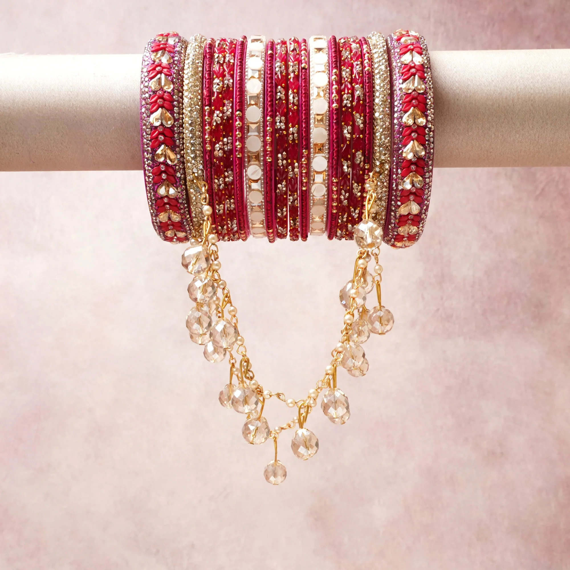 A commanding ruby red anchors this beautiful set, enriched with accents of gold that add depth and dimension.

Featuring a striking composition of glass beads and rhinestones, this set carries intricate craftsmanship and strong presence. Grand in form, it is created for moments that deserve to be marked.