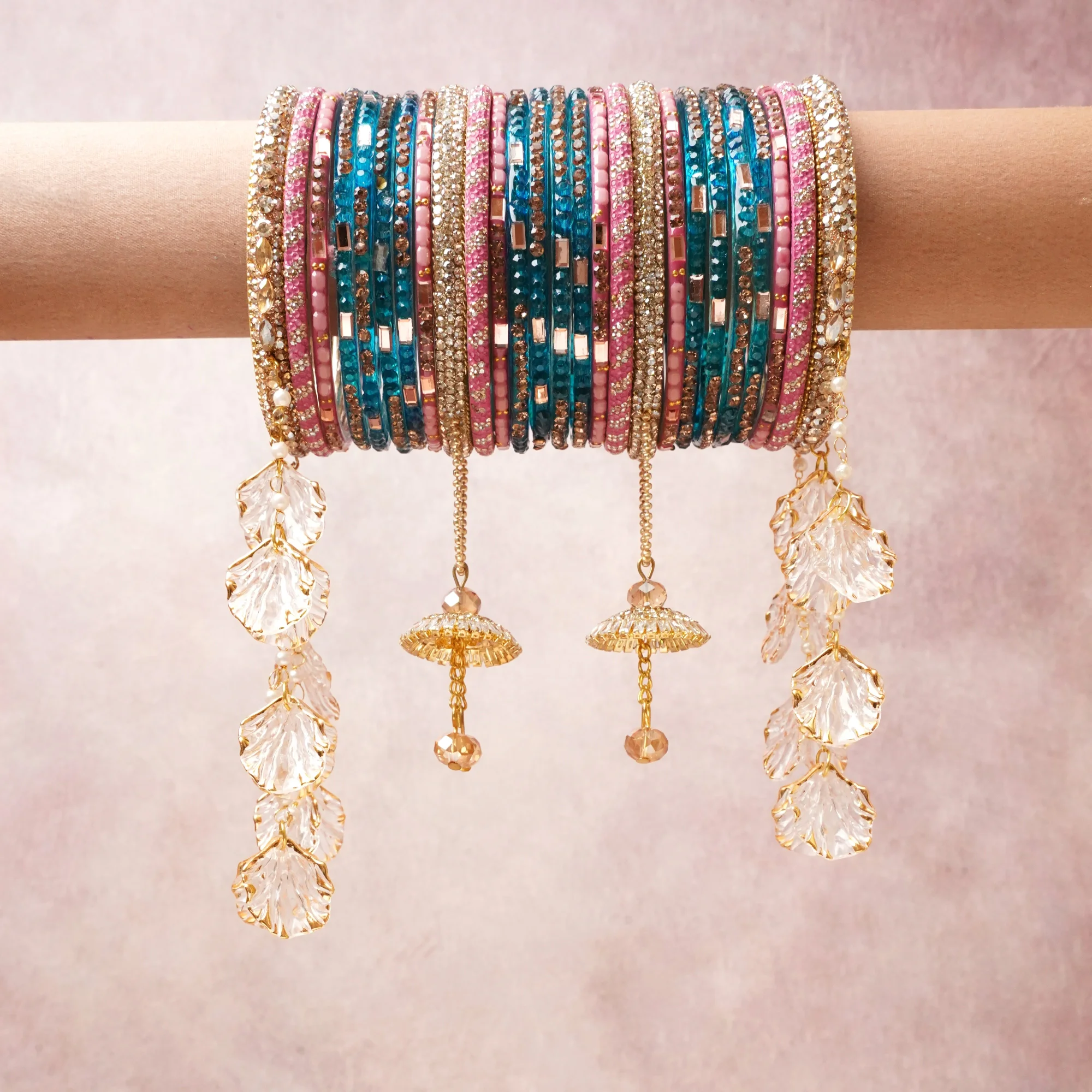 A commanding teal anchors this beautiful set, enriched with accents of pink, gold that add depth and dimension.

Featuring a striking composition of crystal, rhinestone, gold-tone metal, this set carries intricate craftsmanship and strong presence. Grand in form, it is created for moments that deserve to be marked.