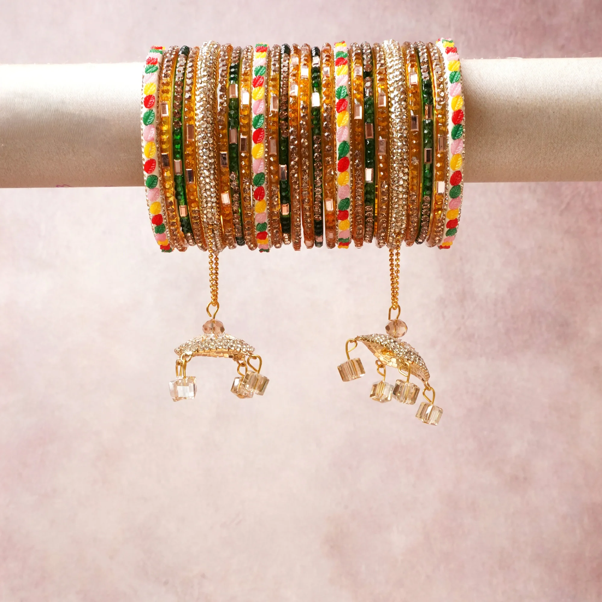 A commanding gold anchors this beautiful set, enriched with accents of clear, green that add depth and dimension.

Featuring a striking composition of metal, rhinestones, beads, this set carries intricate craftsmanship and strong presence. Grand in form, it is created for moments that deserve to be marked.