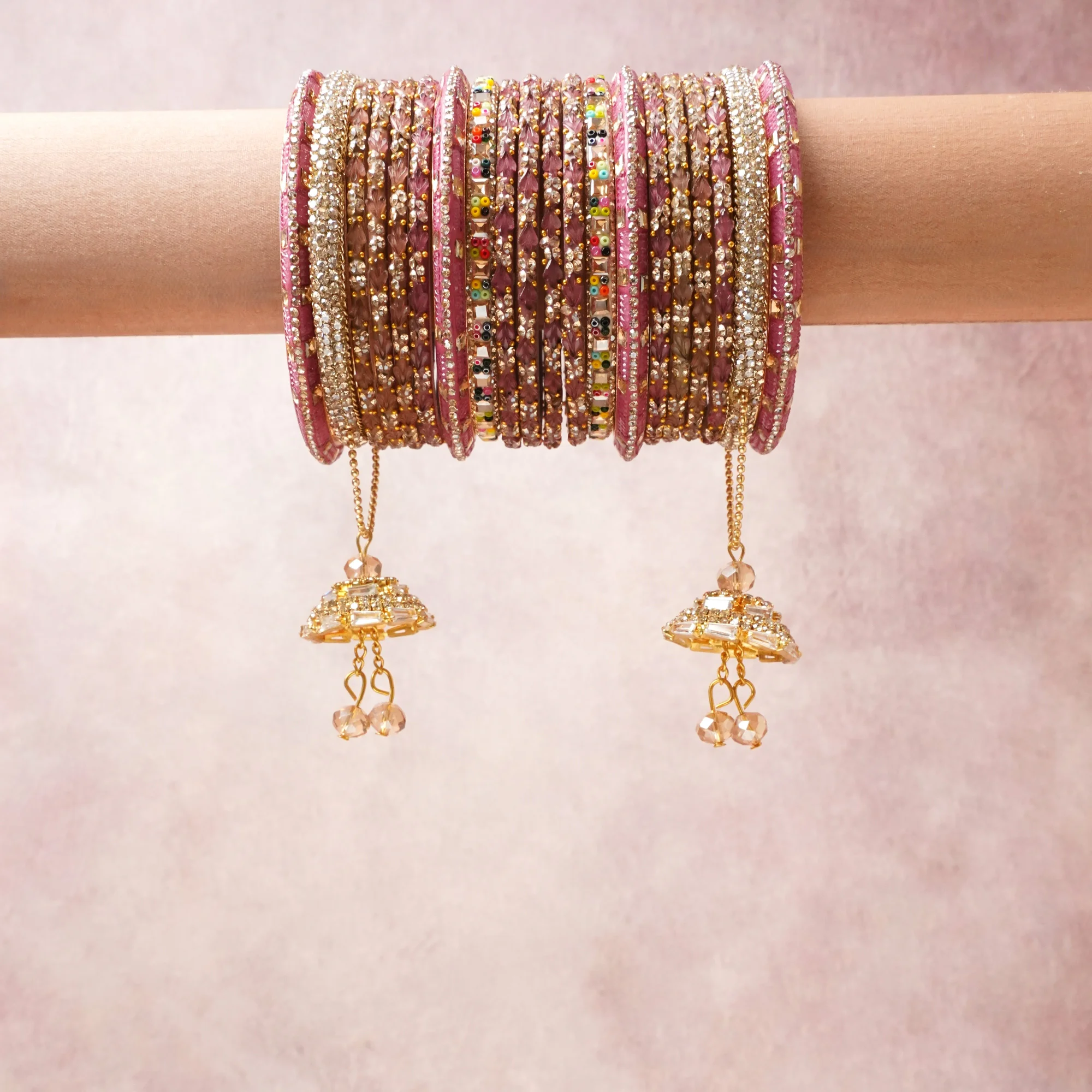 A commanding Rose Pink anchors this beautiful set, enriched with accents of Gold, Clear Crystal that add depth and dimension.

Featuring a striking composition of Glass Beads, Rhinestones, Gold-Tone Metal, this set carries intricate craftsmanship and strong presence. Grand in form, it is created for moments that deserve to be marked.