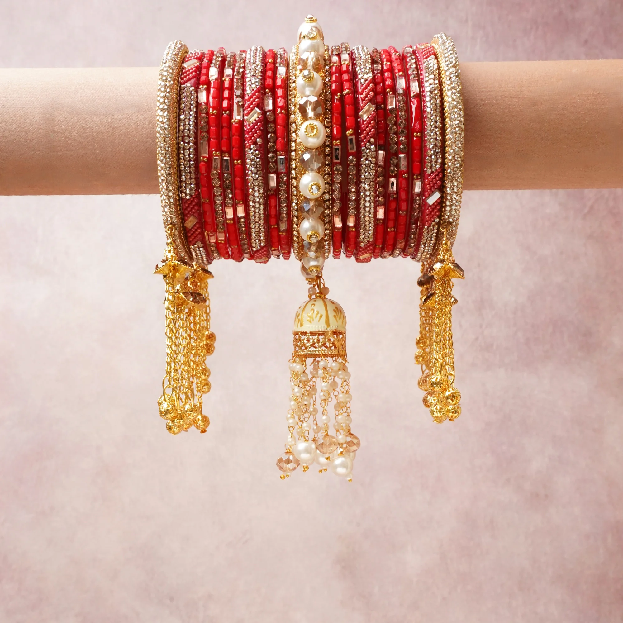 A commanding red anchors this beautiful set, enriched with accents of gold, ivory, clear that add depth and dimension.

Featuring a striking composition of glass beads, rhinestones, faux pearls, gold-tone metal, this set carries intricate craftsmanship and strong presence. Grand in form, it is created for moments that deserve to be marked.
