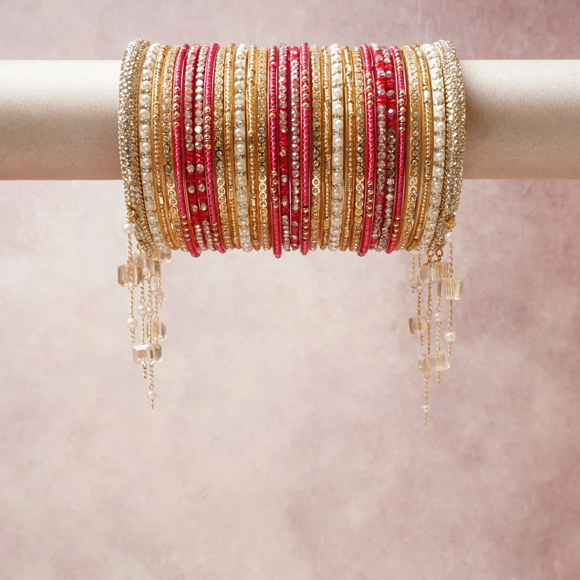 A commanding Gold anchors this beautiful set, enriched with accents of Hot Pink, Ivory, Crystal that add depth and dimension.

Featuring a striking composition of Gold-tone metal, faux pearls, rhinestones, bead tassels, this set carries intricate craftsmanship and strong presence. Grand in form, it is created for moments that deserve to be marked.