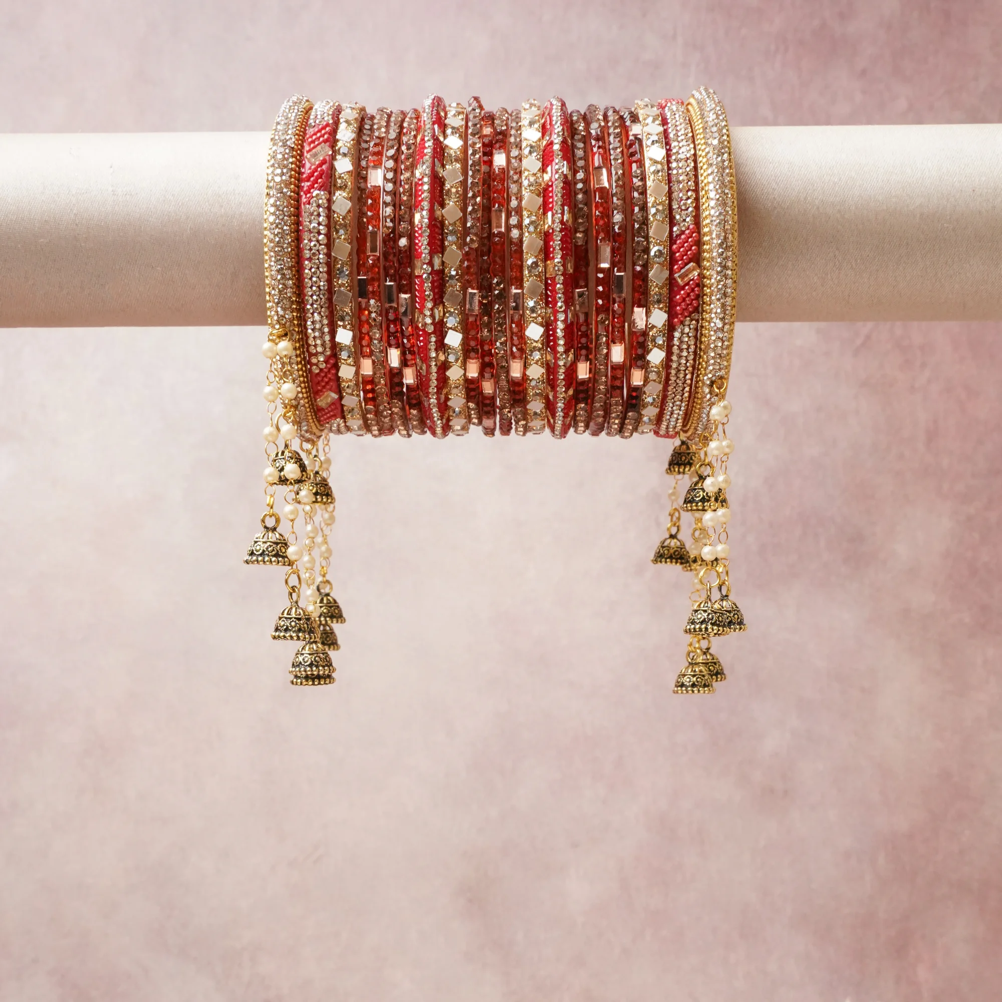 A commanding red anchors this beautiful set, enriched with accents of gold, ivory that add depth and dimension.

Featuring a striking composition of glass beads, metal, faux pearls, this set carries intricate craftsmanship and strong presence. Grand in form, it is created for moments that deserve to be marked.