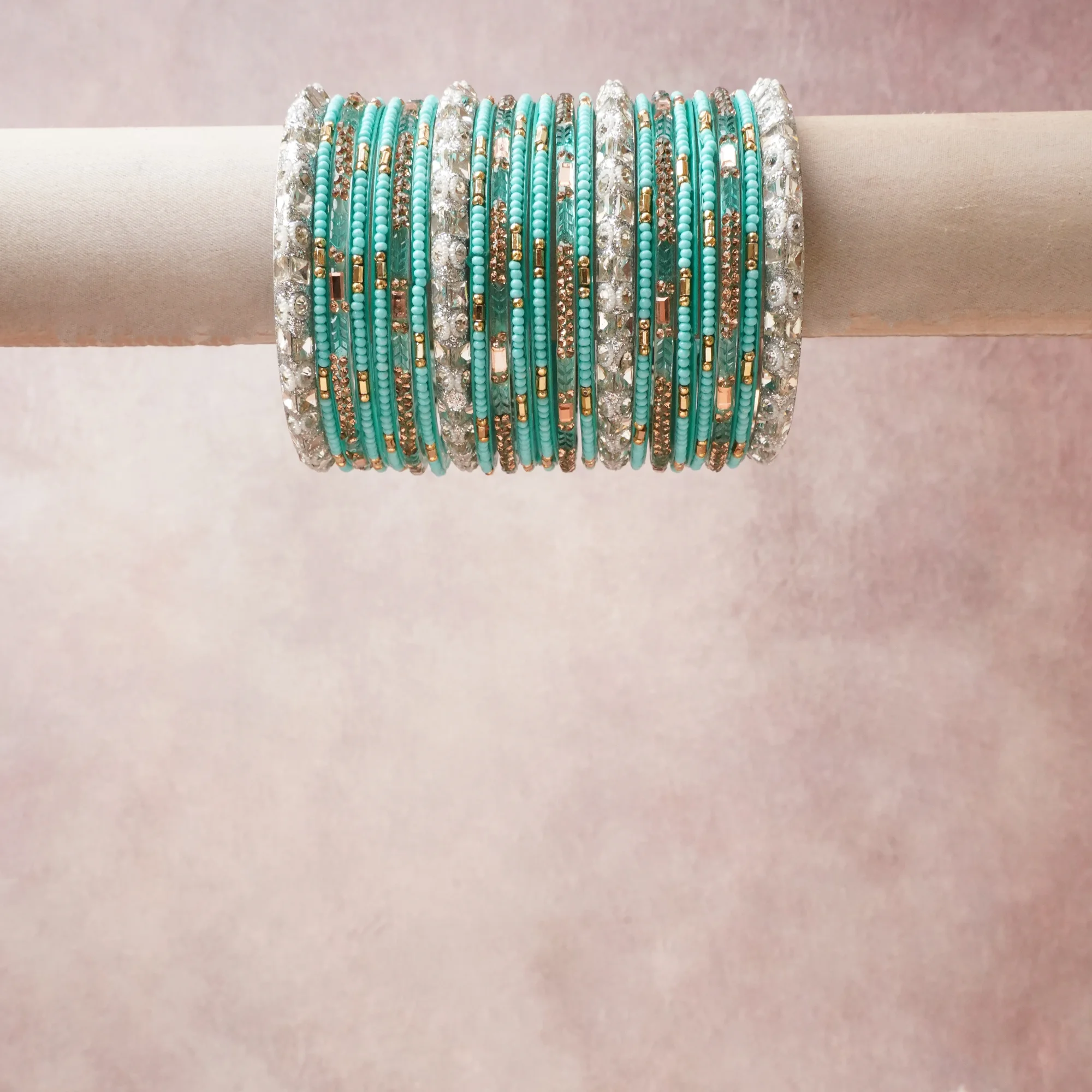 A commanding turquoise anchors this beautiful set, enriched with accents of silver, gold, crystal that add depth and dimension.

Featuring a striking composition of glass beads, rhinestones, metallic spacers, this set carries intricate craftsmanship and strong presence. Grand in form, it is created for moments that deserve to be marked.