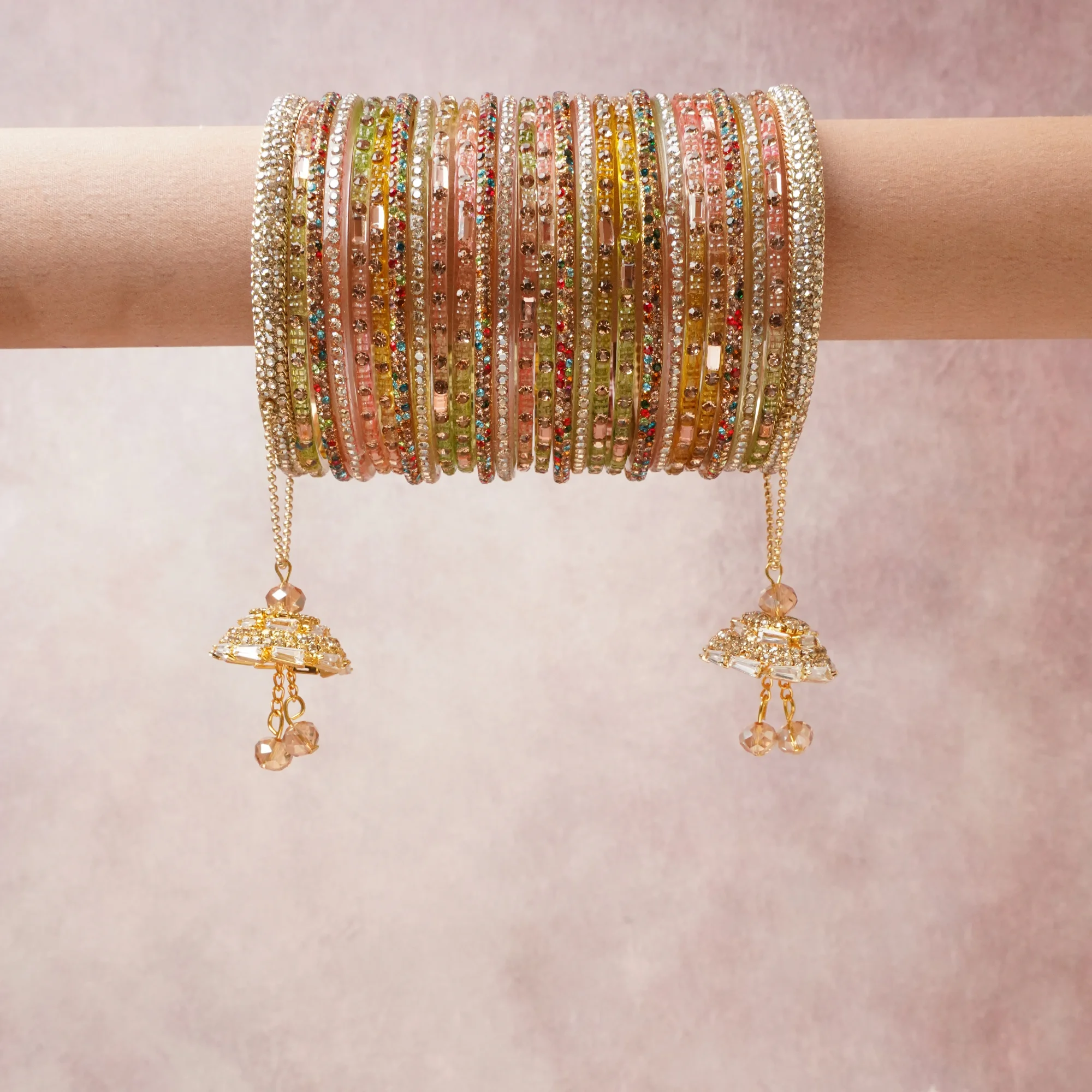 A commanding Multi colour anchors this beautiful set, enriched with accents of Champagne Gold, Rose Gold that add depth and dimension.

Featuring a striking composition of metal, rhinestone, crystal beads, this set carries intricate craftsmanship and strong presence. Grand in form, it is created for moments that deserve to be marked.