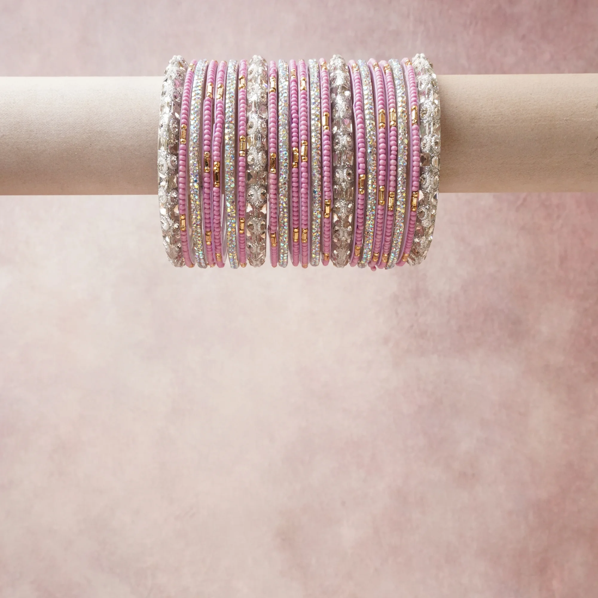 A commanding blush pink anchors this beautiful set, enriched with accents of silver, gold that add depth and dimension.

Featuring a striking composition of beaded crystal and rhinestone bracelet, this set carries intricate craftsmanship and strong presence. Grand in form, it is created for moments that deserve to be marked.
