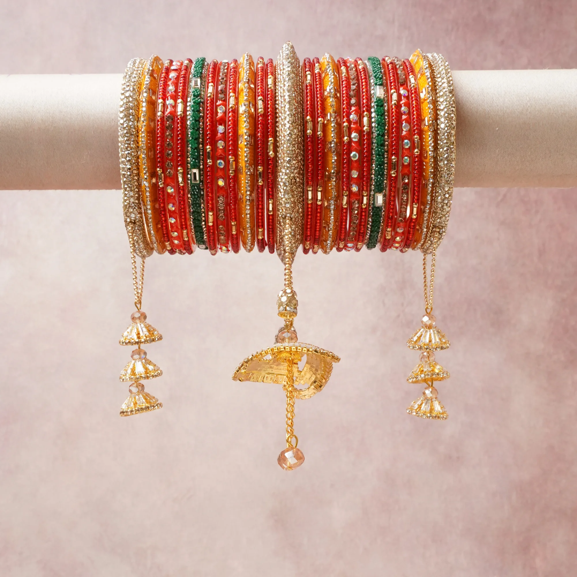 A commanding red anchors this beautiful set, enriched with accents of gold, green, white that add depth and dimension.

Featuring a striking composition of glass beads, rhinestones, metal, this set carries intricate craftsmanship and strong presence. Grand in form, it is created for moments that deserve to be marked.