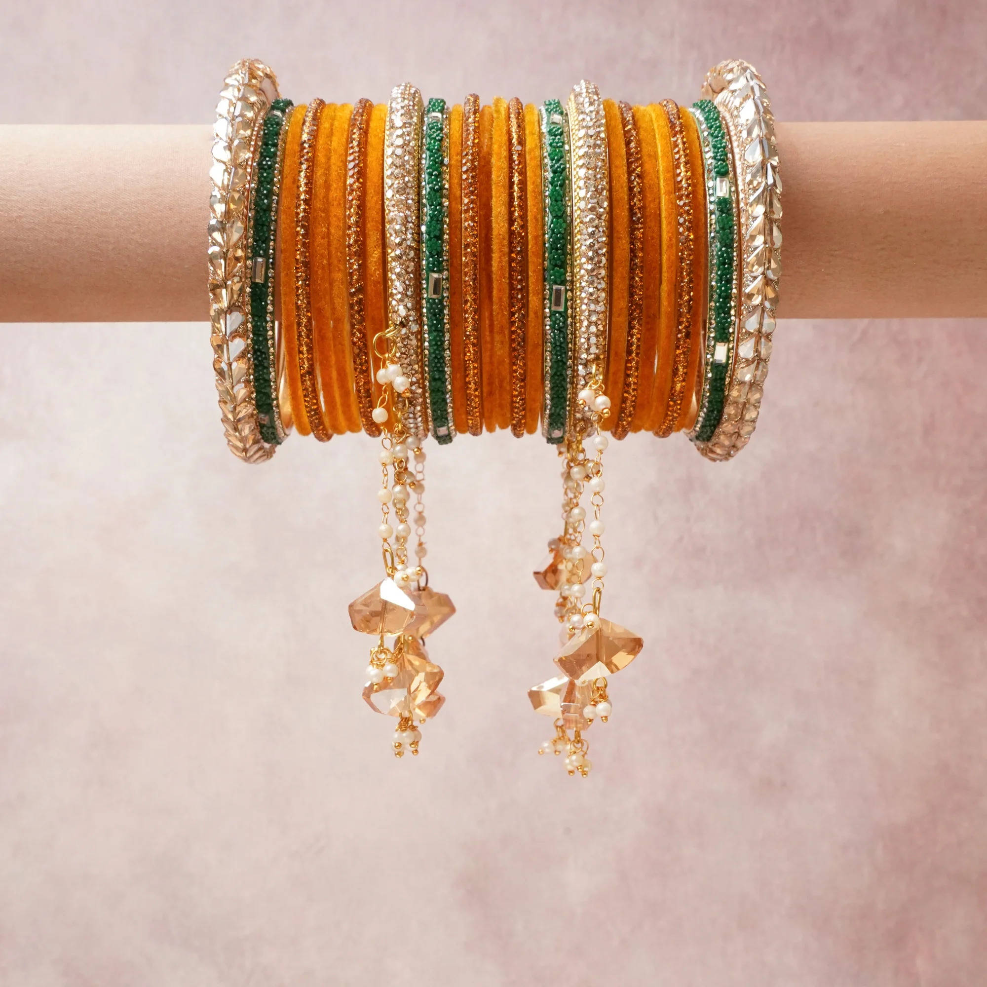 A commanding orange anchors this beautiful set, enriched with accents of gold, green, white that add depth and dimension.

Featuring a striking composition of silk thread, rhinestone, crystal, pearl beads, metal, this set carries intricate craftsmanship and strong presence. Grand in form, it is created for moments that deserve to be marked.