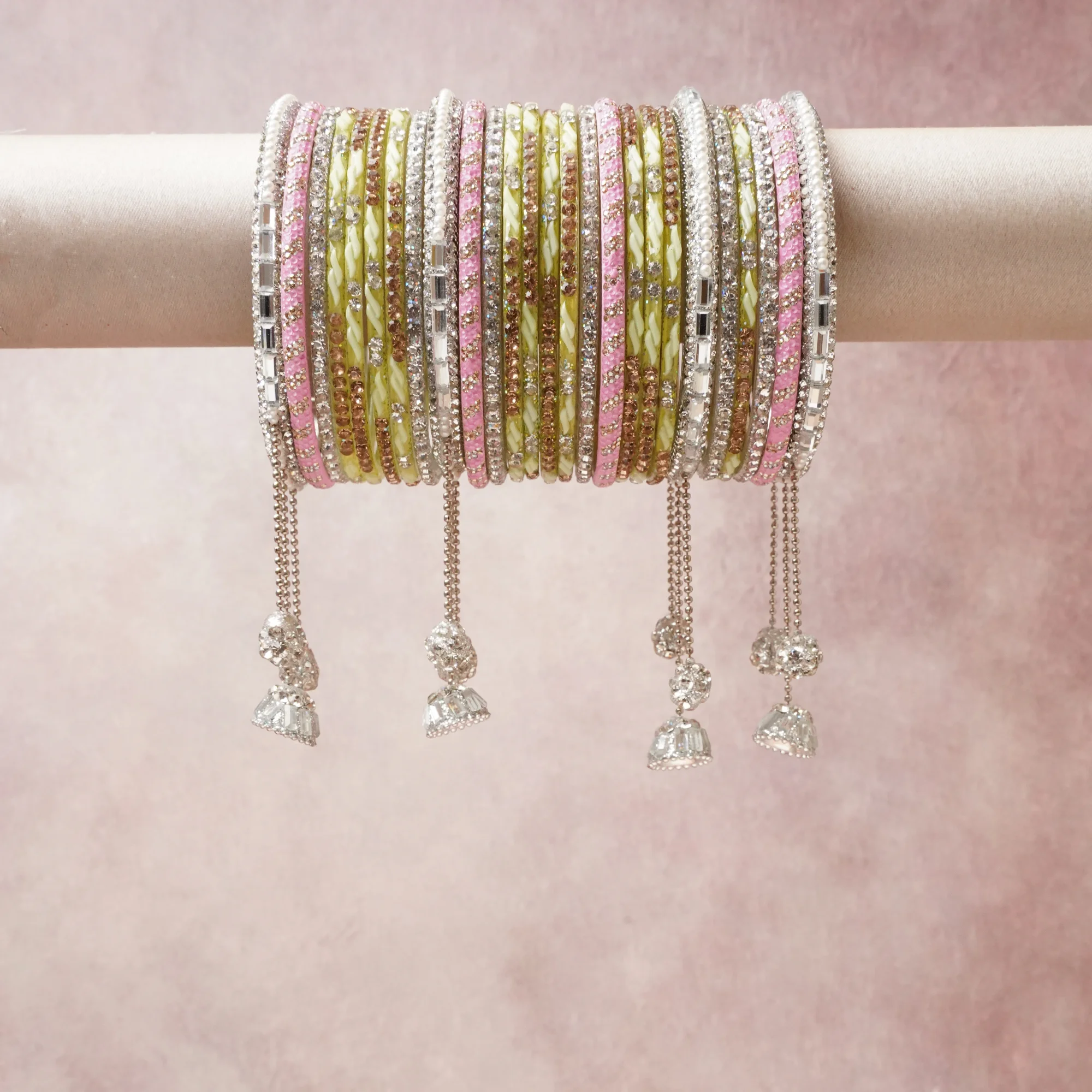 A commanding blush pink anchors this beautiful set, enriched with accents of pastel green, champagne gold, silver that add depth and dimension.

Featuring a striking composition of rhinestone, enamel, metal, this set carries intricate craftsmanship and strong presence. Grand in form, it is created for moments that deserve to be marked.